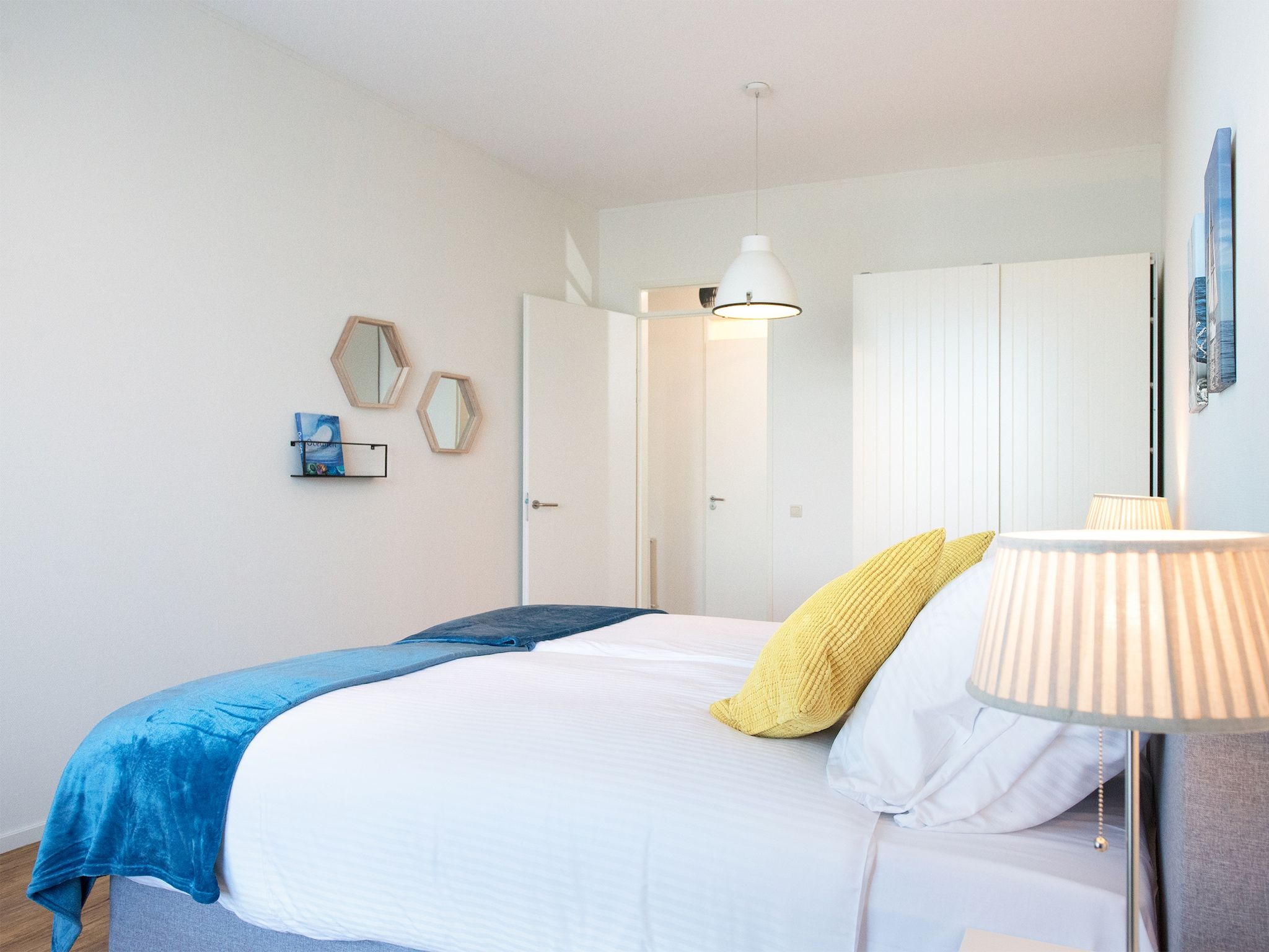 Een slaapkamer van Scheveningen Harbour 54 in Den Haag