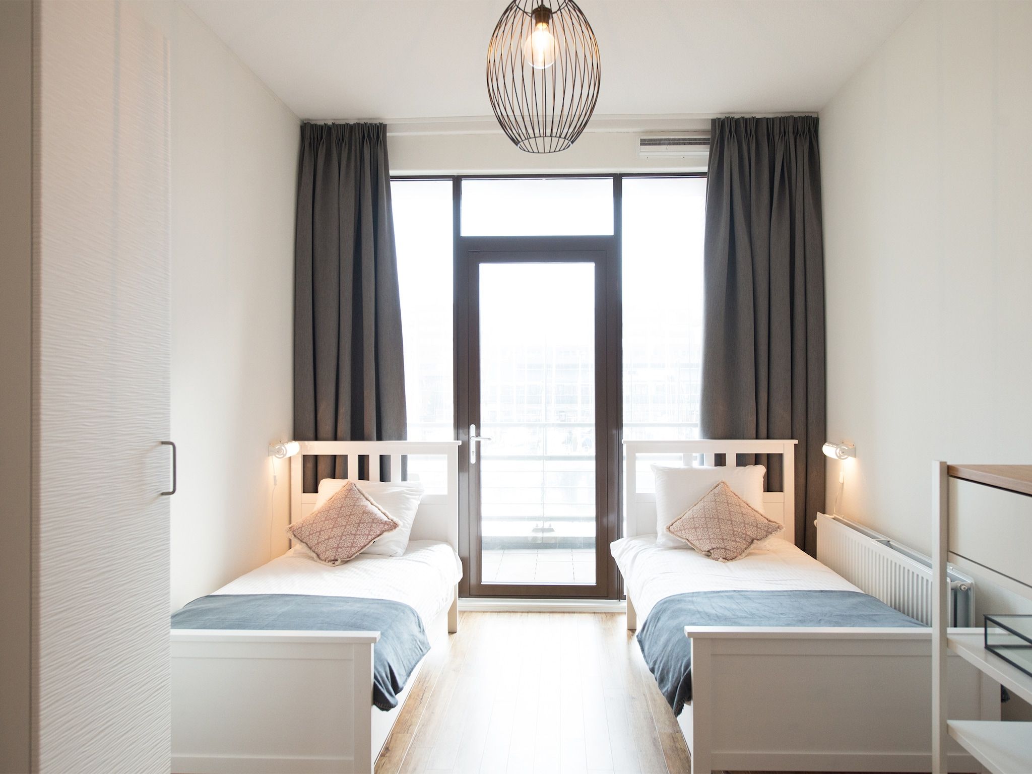Een slaapkamer van Scheveningen Harbour 54A in Den Haag