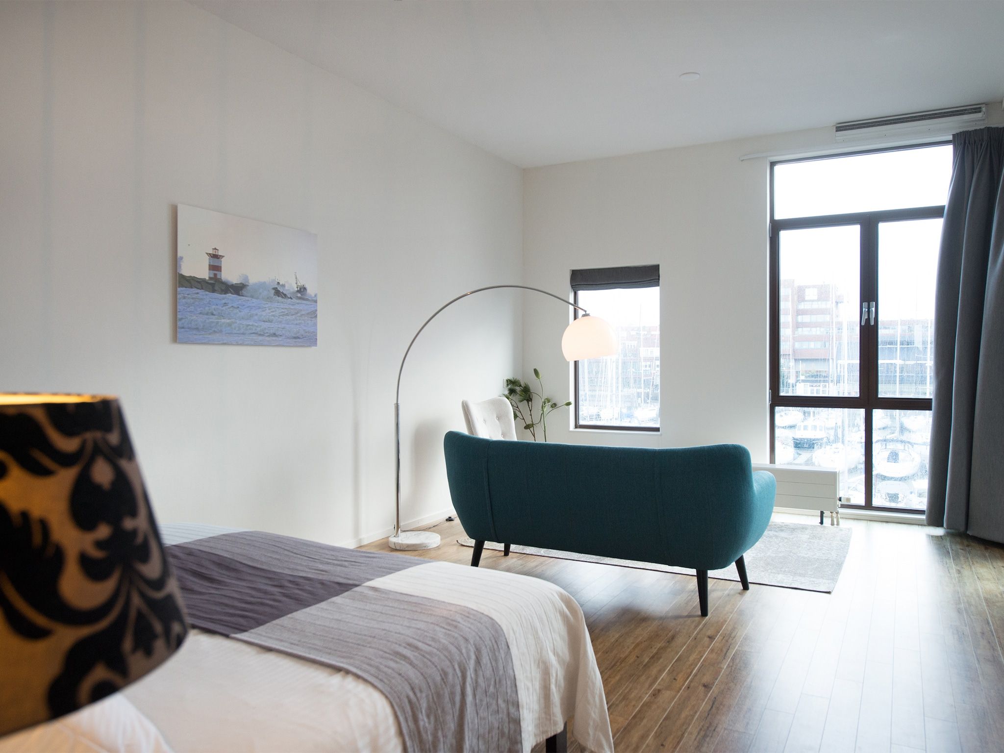 Een slaapkamer van Scheveningen Harbour 54A in Den Haag