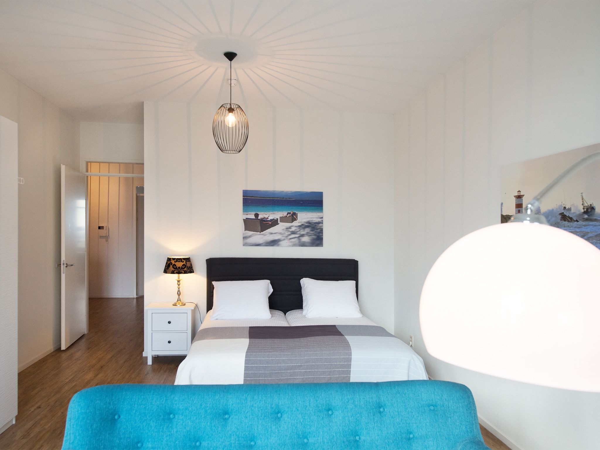 Een slaapkamer van Scheveningen Harbour 54A in Den Haag