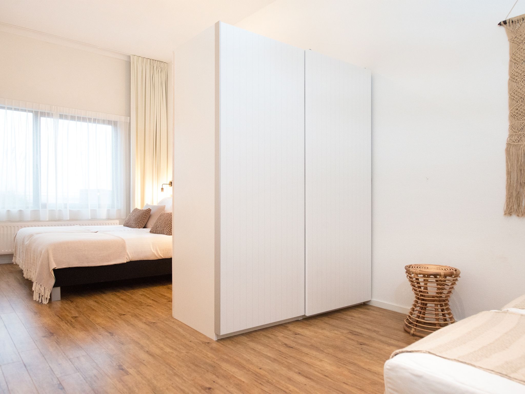 Een slaapkamer van Scheveningen Harbour 56C in Den Haag