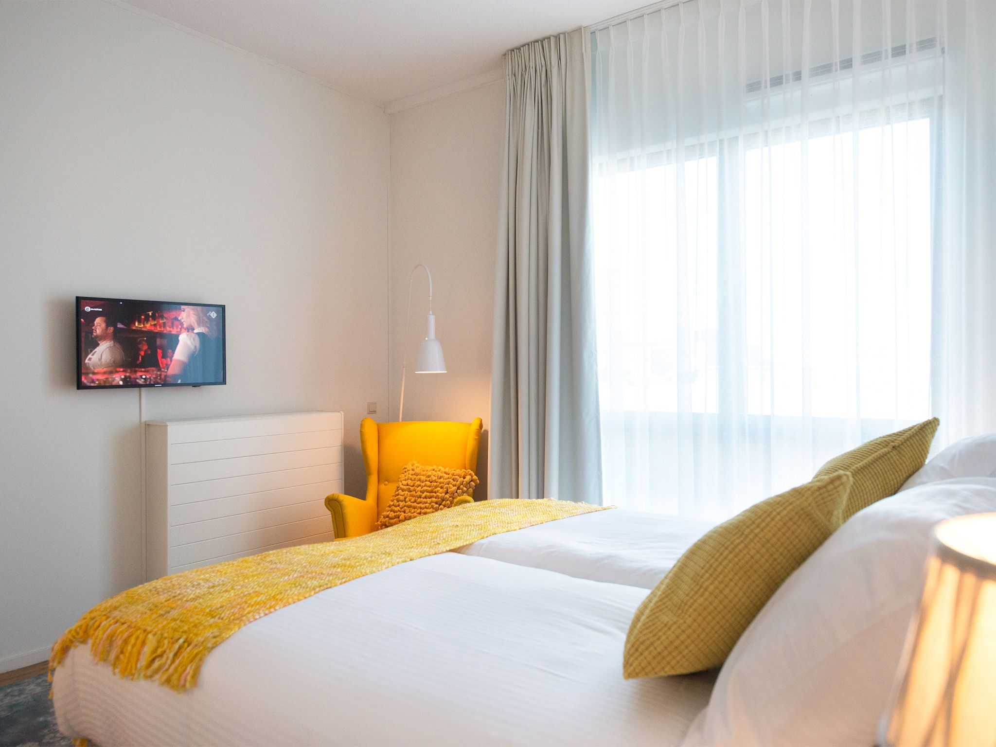 Een slaapkamer van Scheveningen Harbour 56D in Den Haag