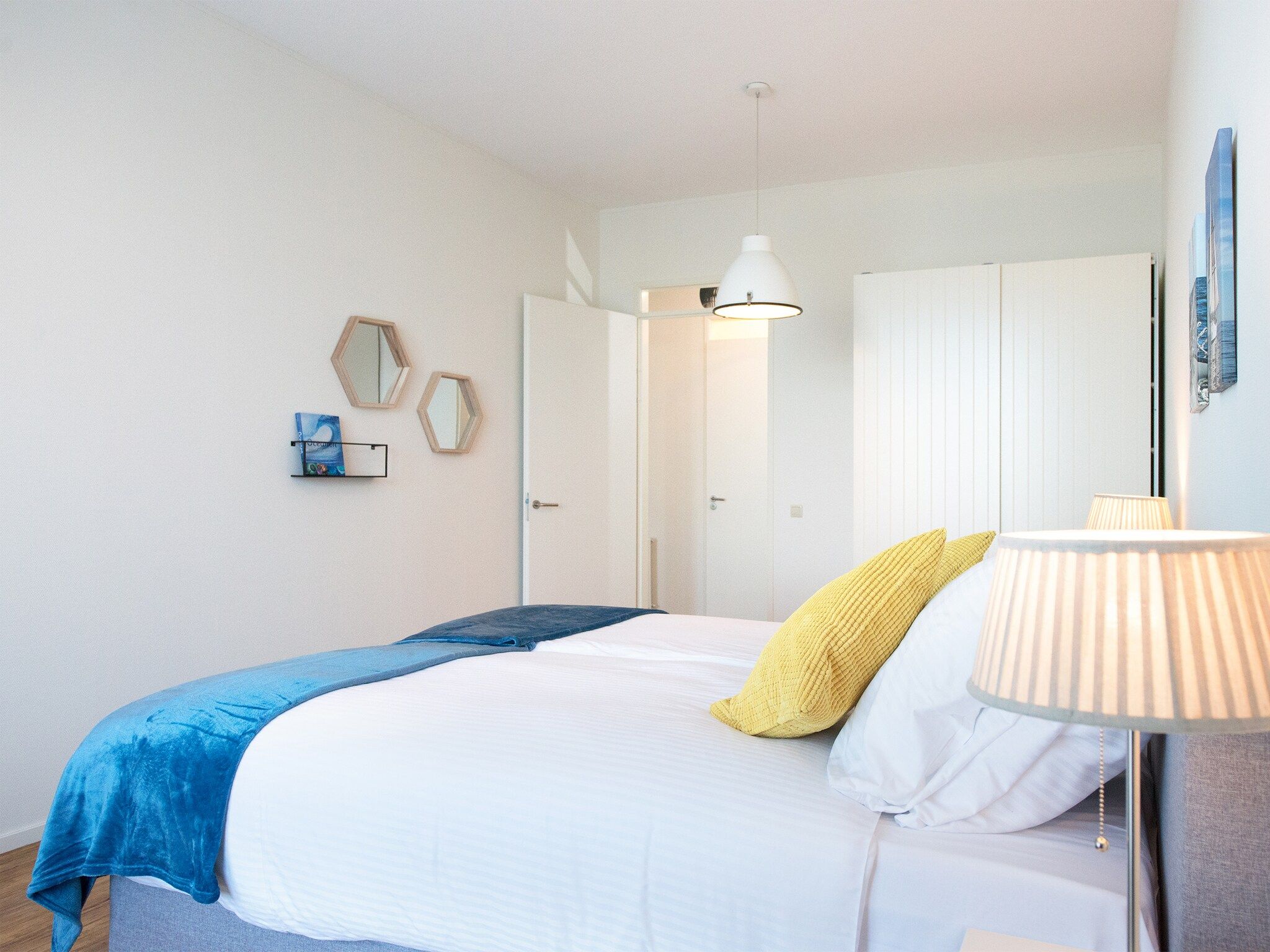 Een slaapkamer van Scheveningen Harbour 56D in Den Haag