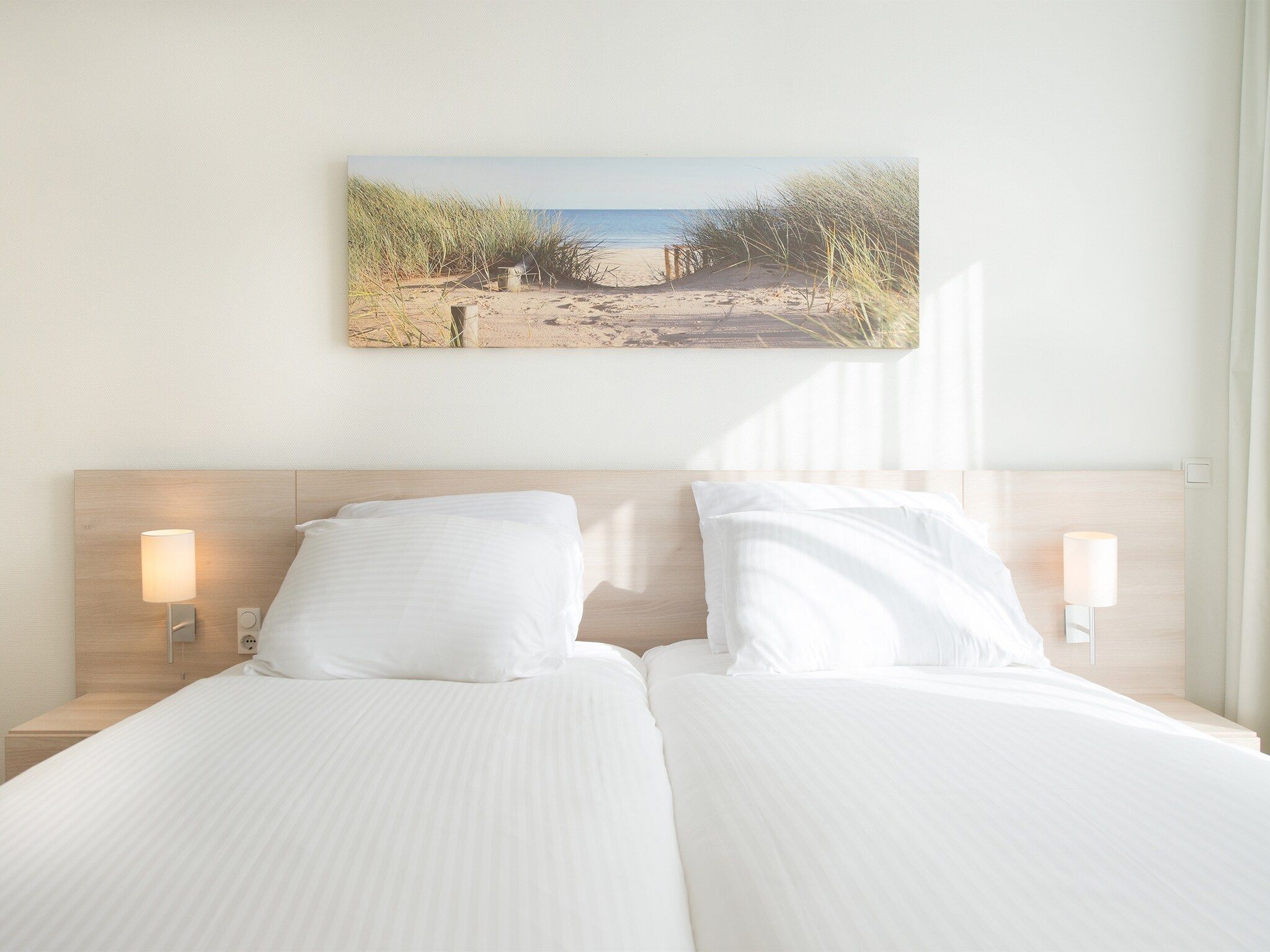 Een slaapkamer van Scheveningen Harbour 58C in Den Haag