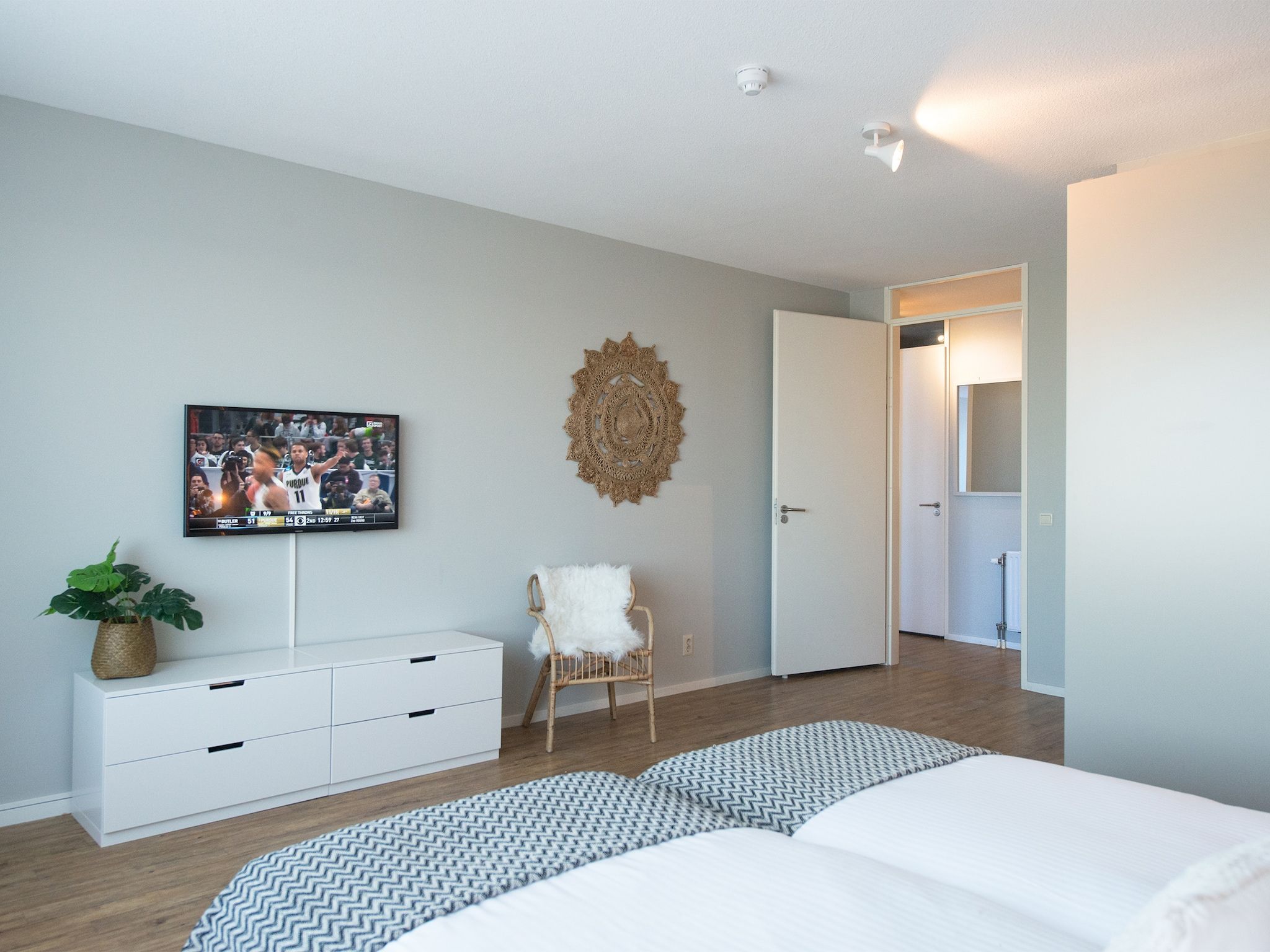 Een slaapkamer van Scheveningen Harbour 58 in Den Haag