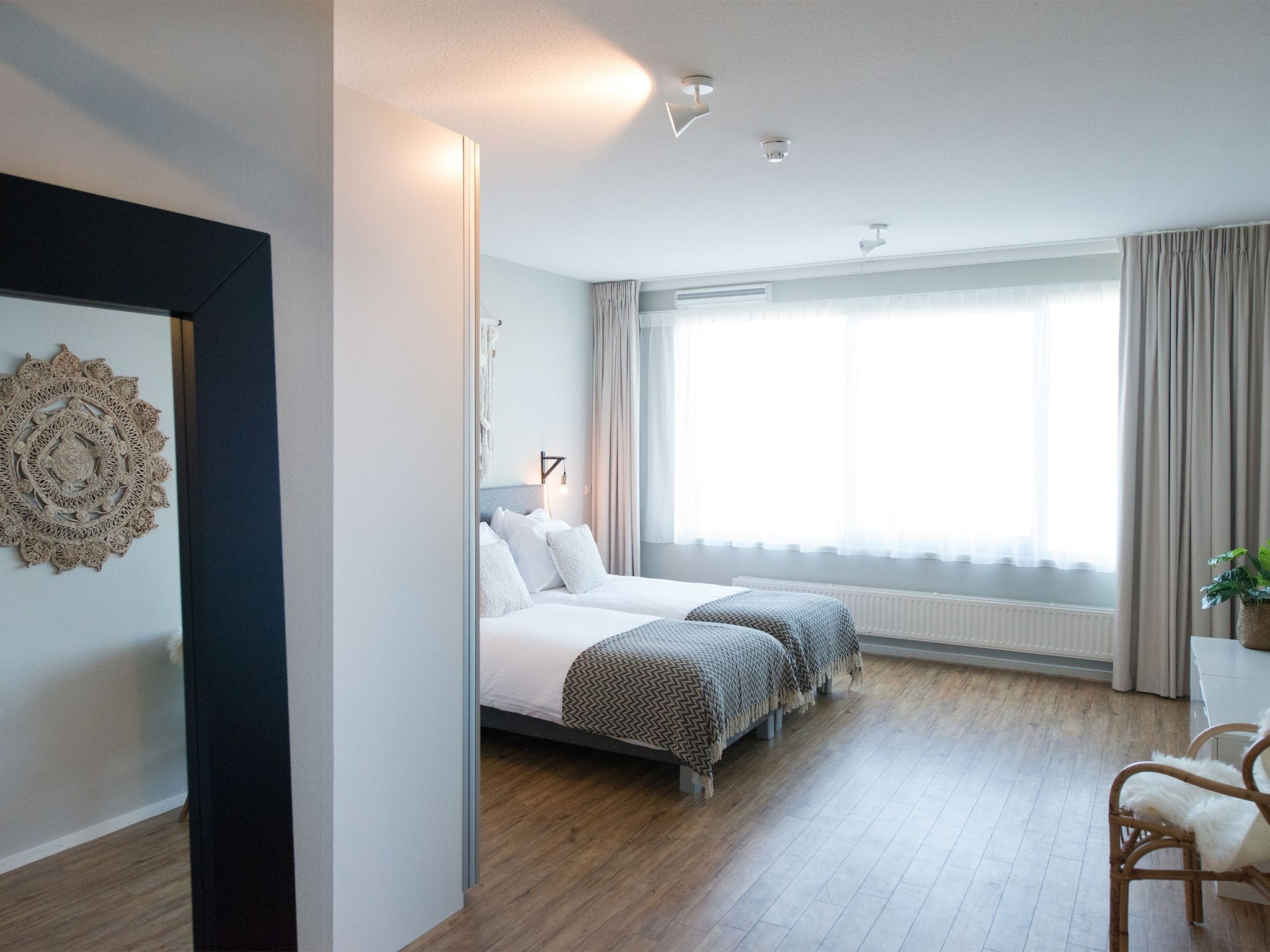 Een slaapkamer van Scheveningen Harbour 58 in Den Haag