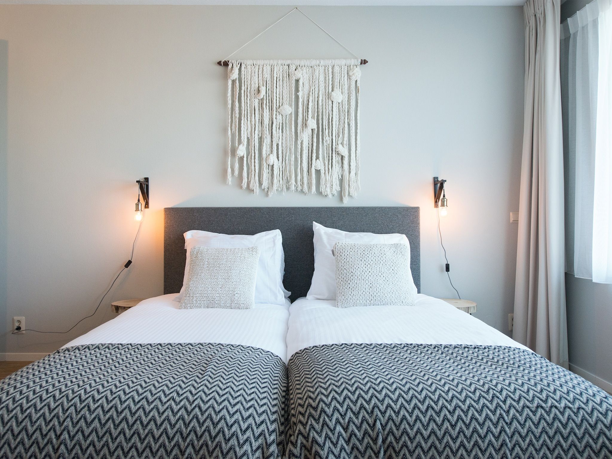 Een slaapkamer van Scheveningen Harbour 58 in Den Haag