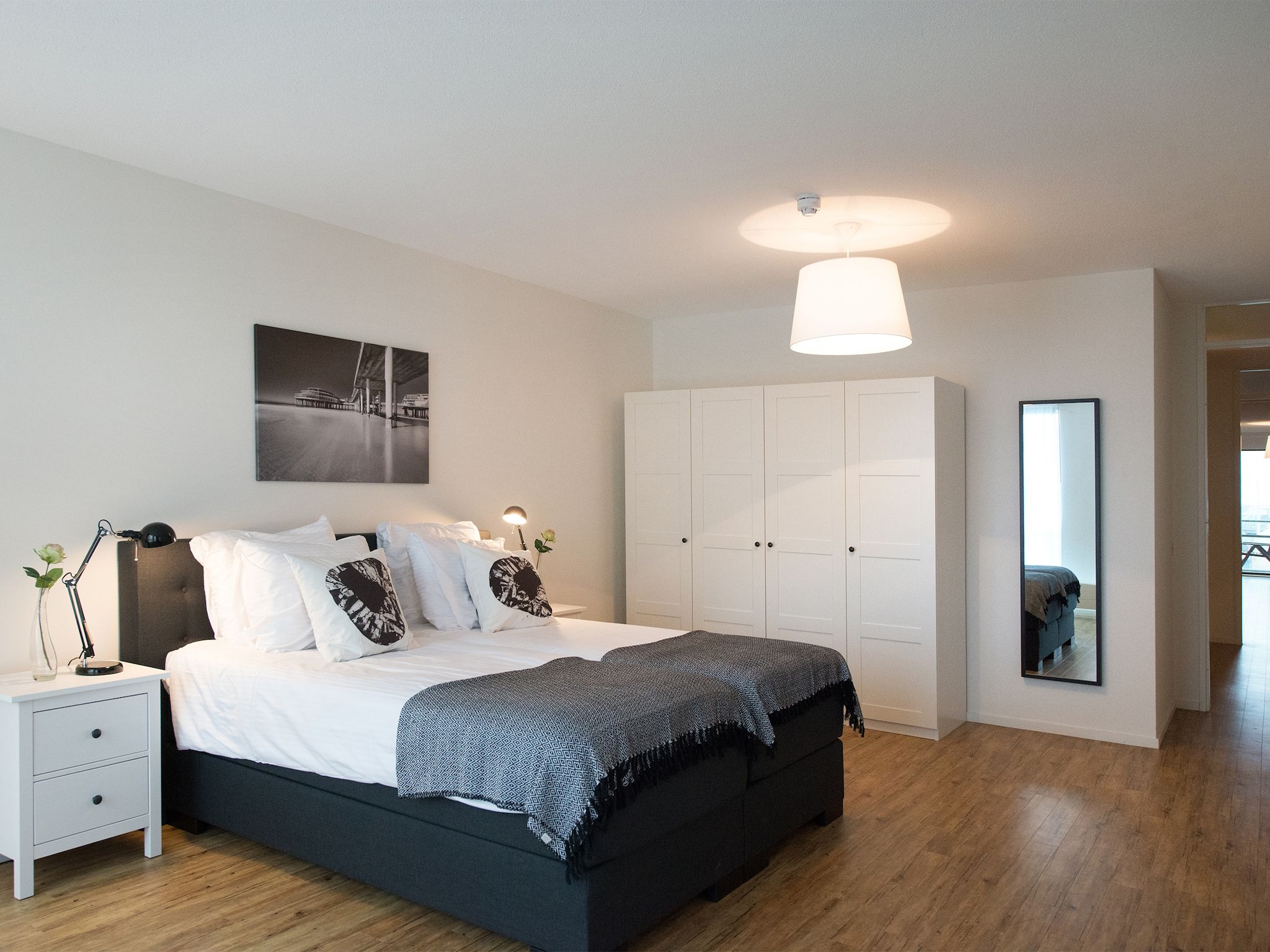 Een slaapkamer van Scheveningen Harbour 60B in Den Haag