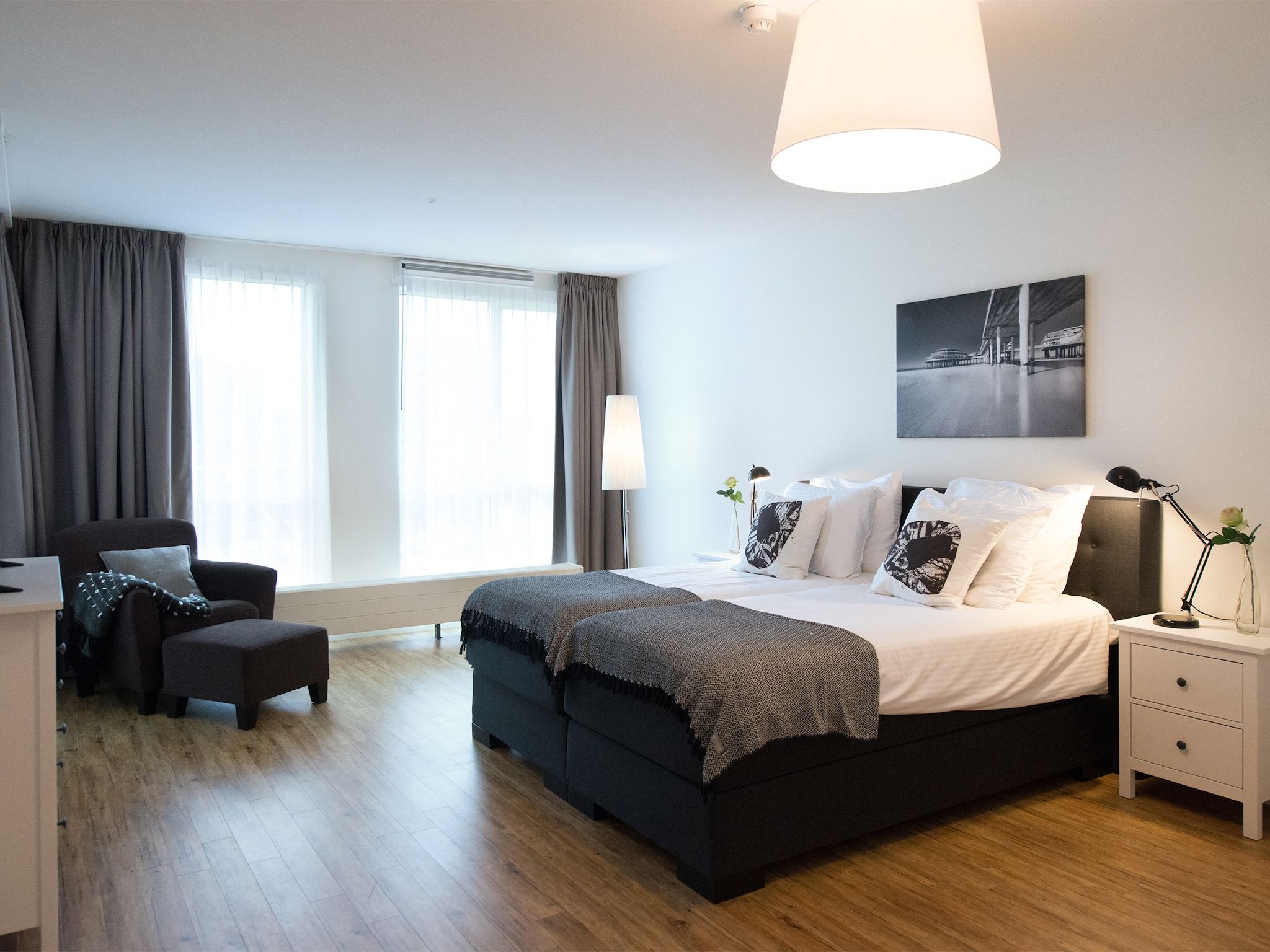 Een slaapkamer van Scheveningen Harbour 60B in Den Haag