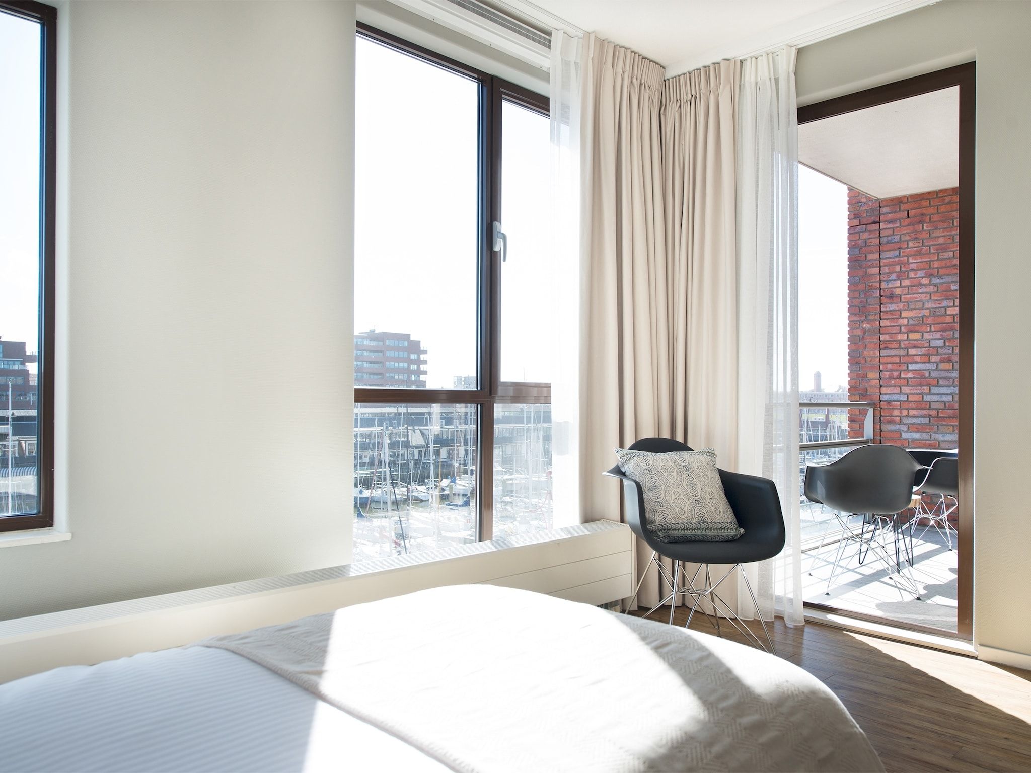 Een slaapkamer van Scheveningen Harbour 62A in Den Haag