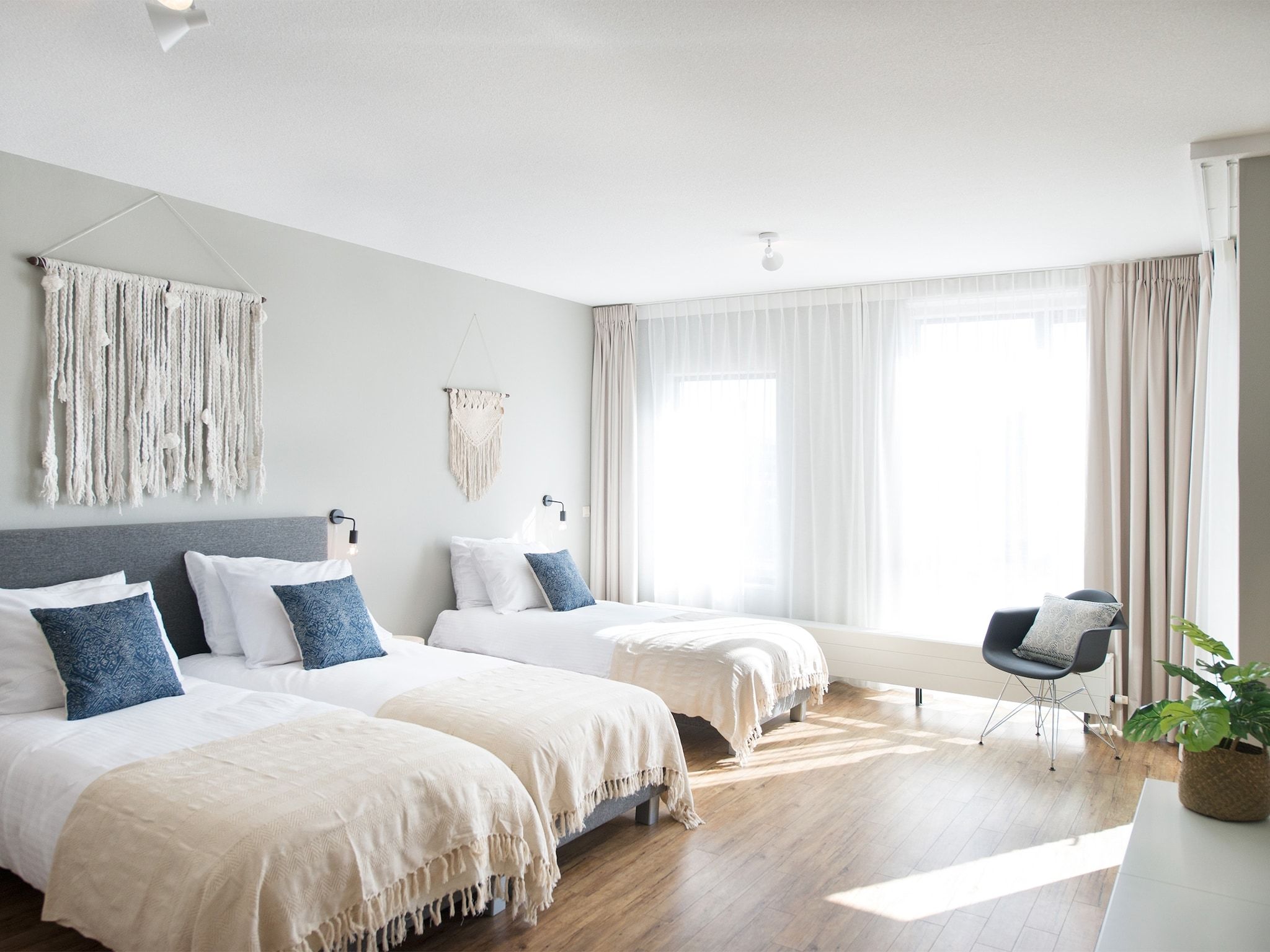 Een slaapkamer van Scheveningen Harbour 62A in Den Haag