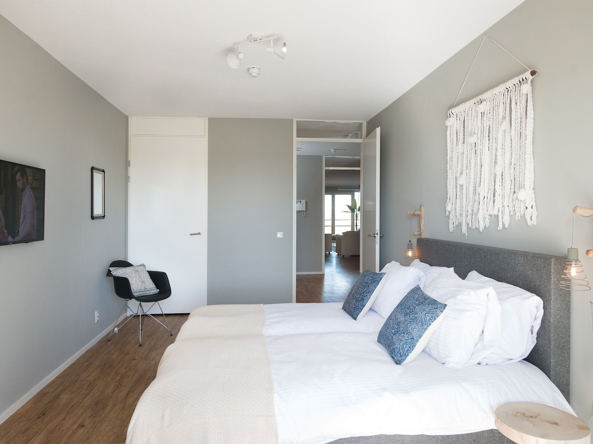 Een slaapkamer van Scheveningen Harbour 62A in Den Haag