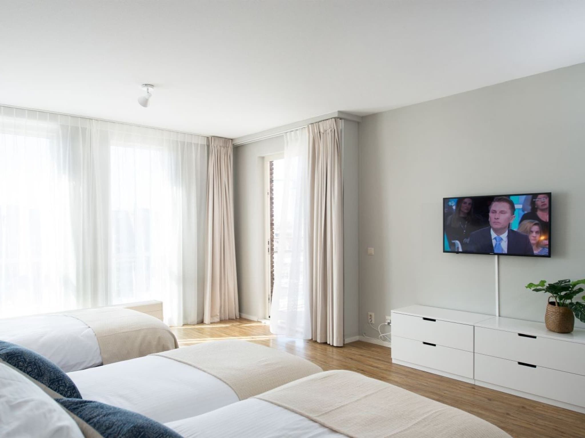 Een slaapkamer van Scheveningen Harbour 68B in Den Haag