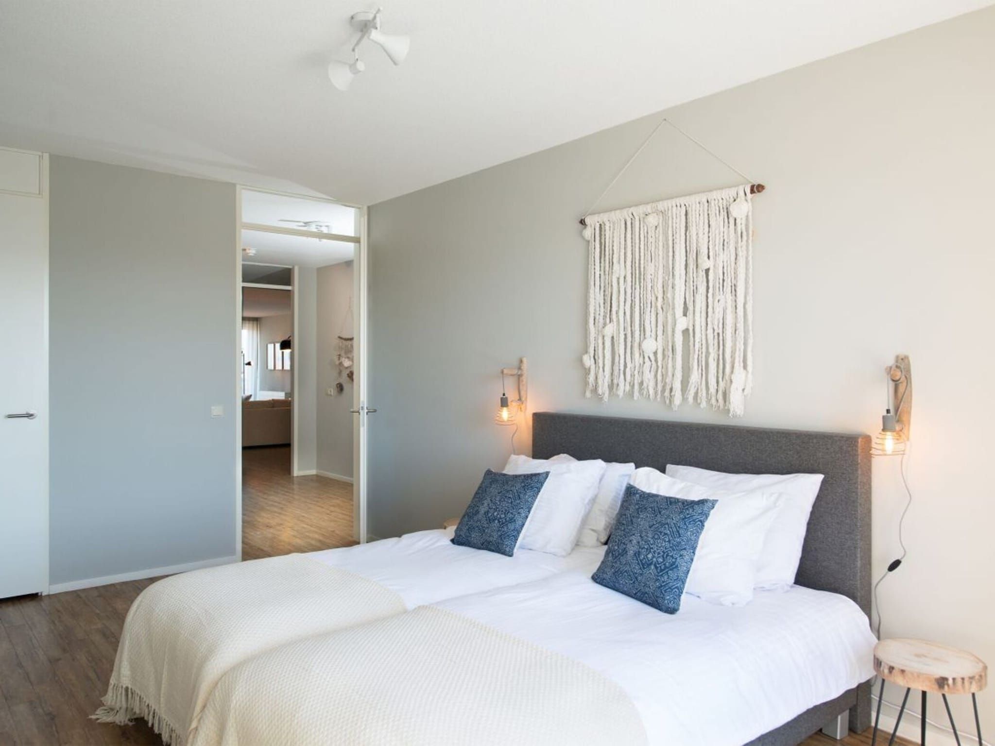 Een slaapkamer van Scheveningen Harbour 68B in Den Haag