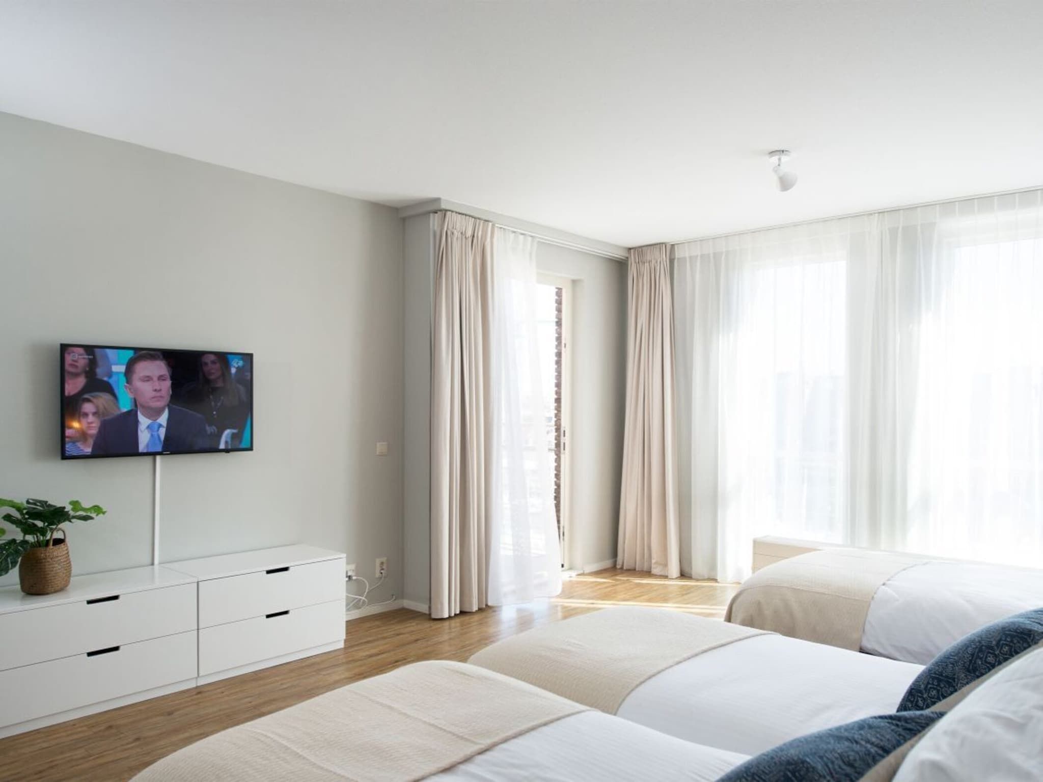 Een slaapkamer van Scheveningen Harbour 68B in Den Haag
