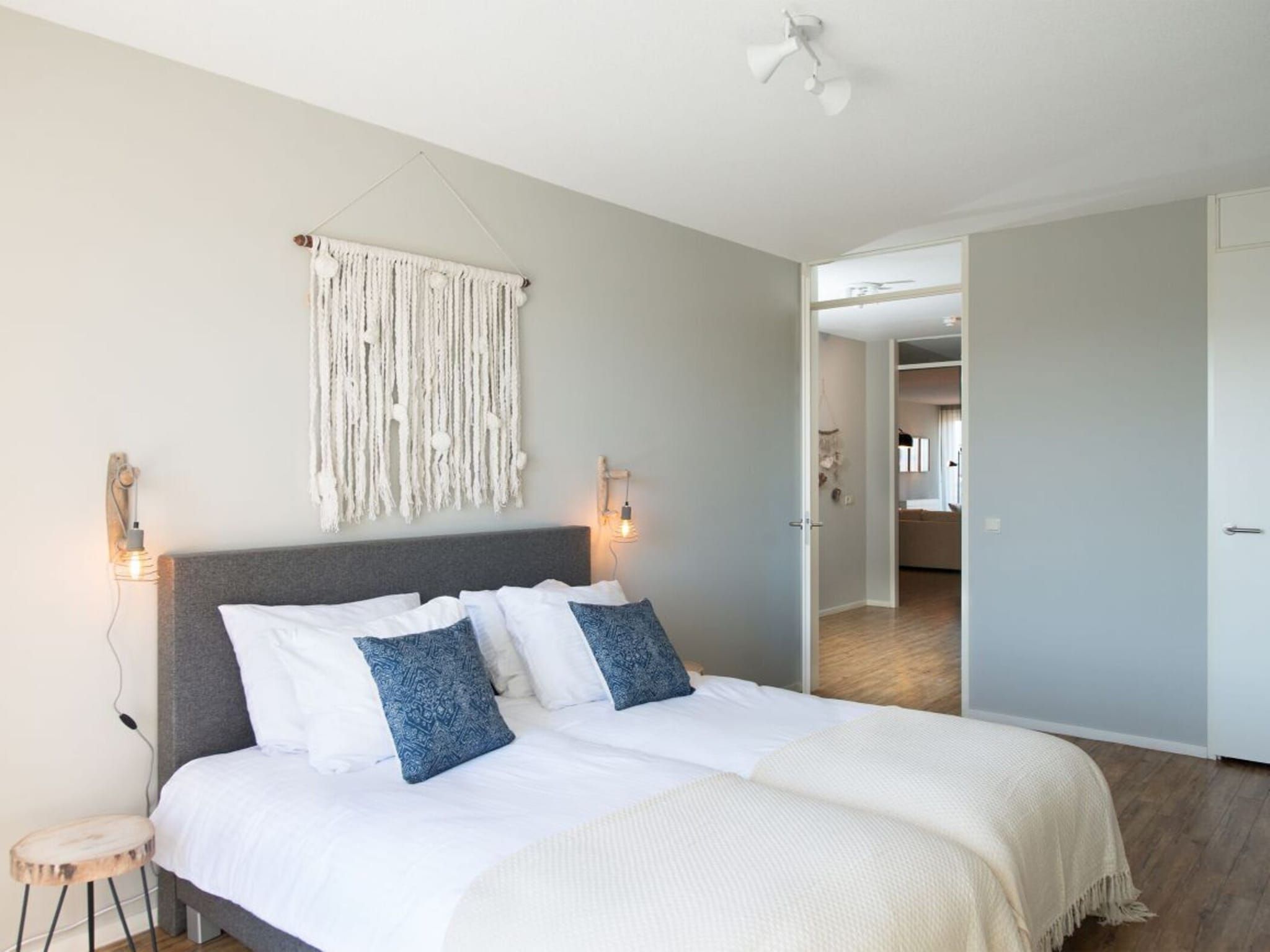Een slaapkamer van Scheveningen Harbour 68B in Den Haag