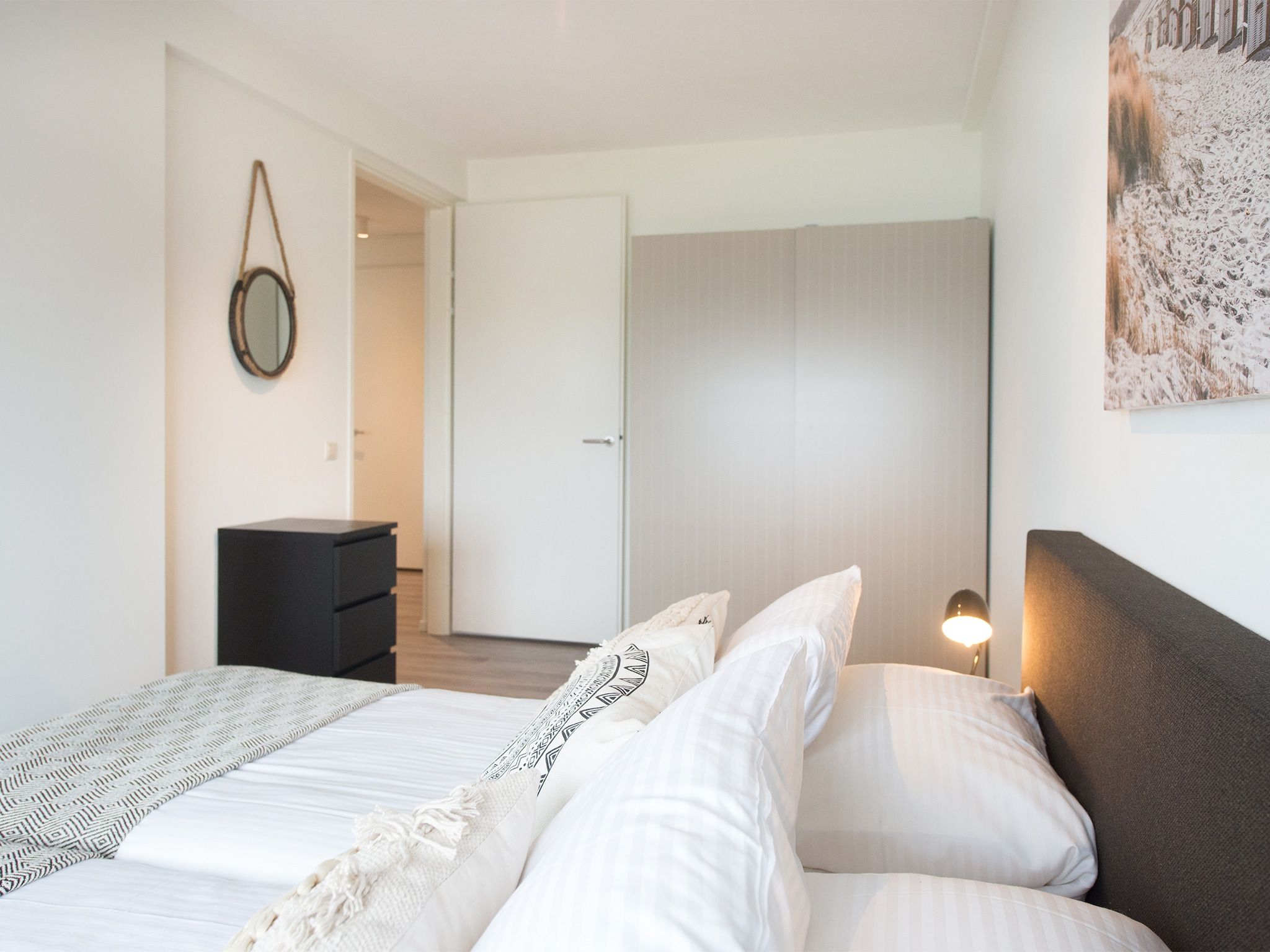 Een slaapkamer van Scheveningen Harbour 70 in Den Haag
