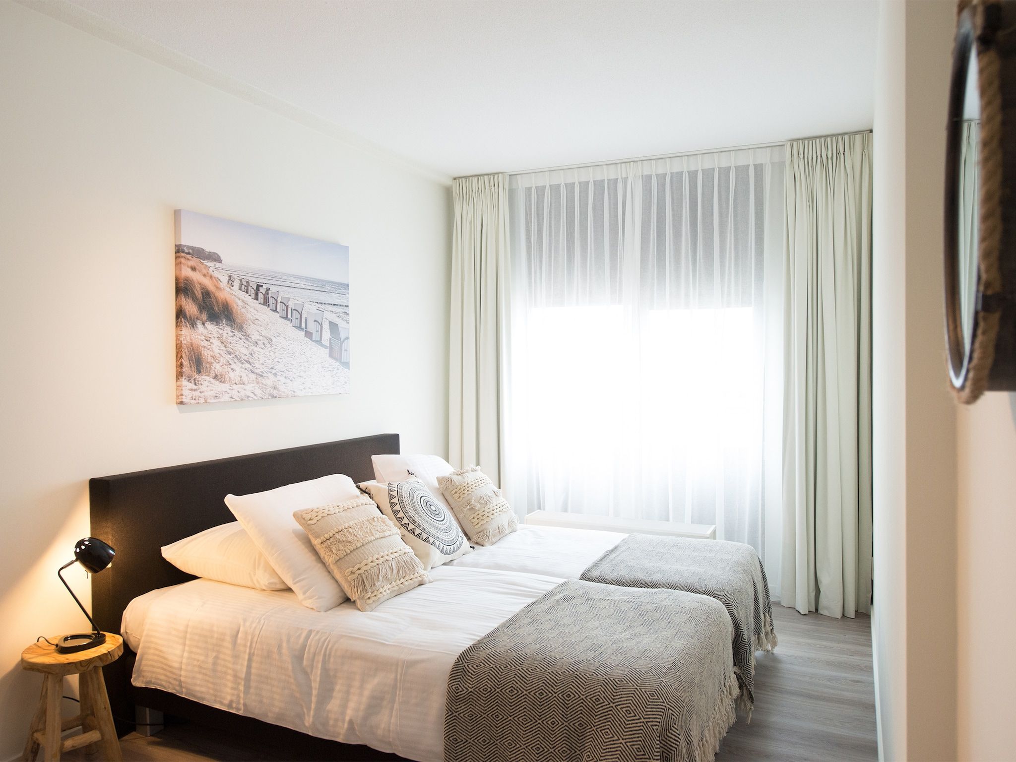 Een slaapkamer van Scheveningen Harbour 70 in Den Haag