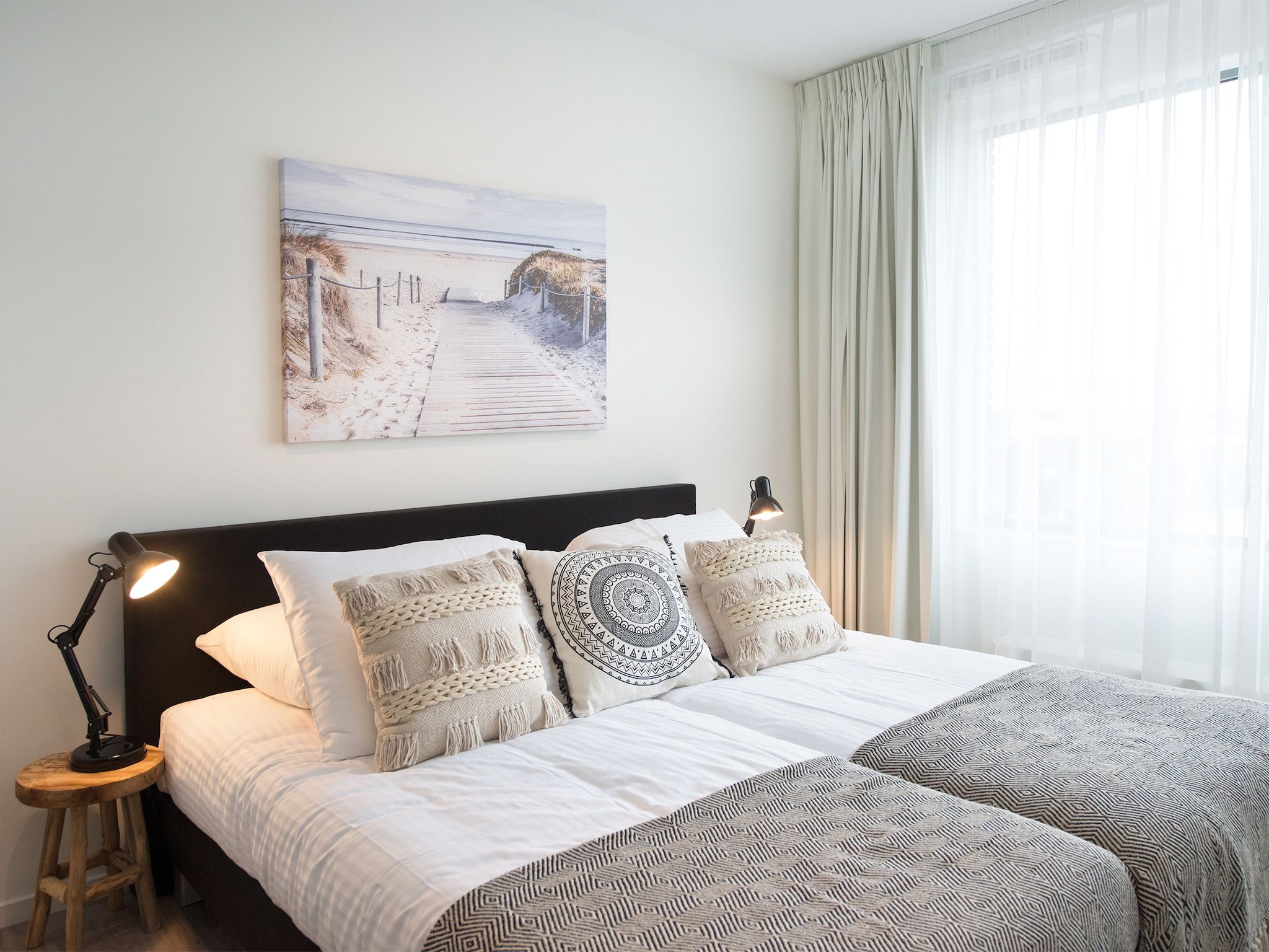 Een slaapkamer van Scheveningen Harbour 70 in Den Haag