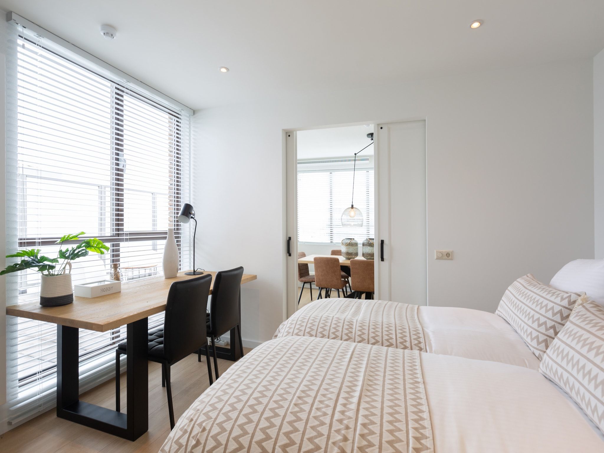 Een slaapkamer van Scheveningen Harbour 72A in Den Haag