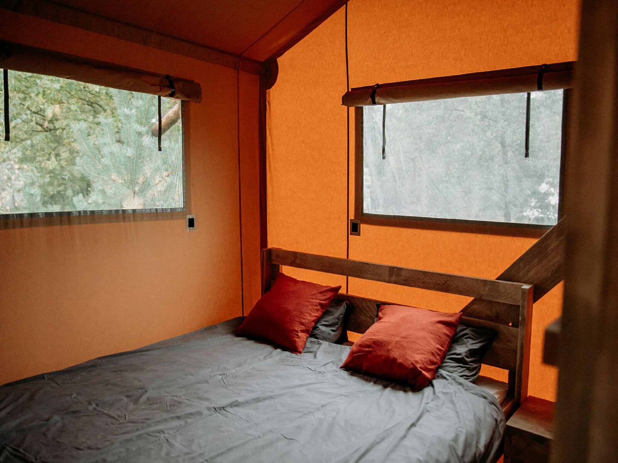 Een slaapkamer van Vakantiepark Mölke 33 in Zuna