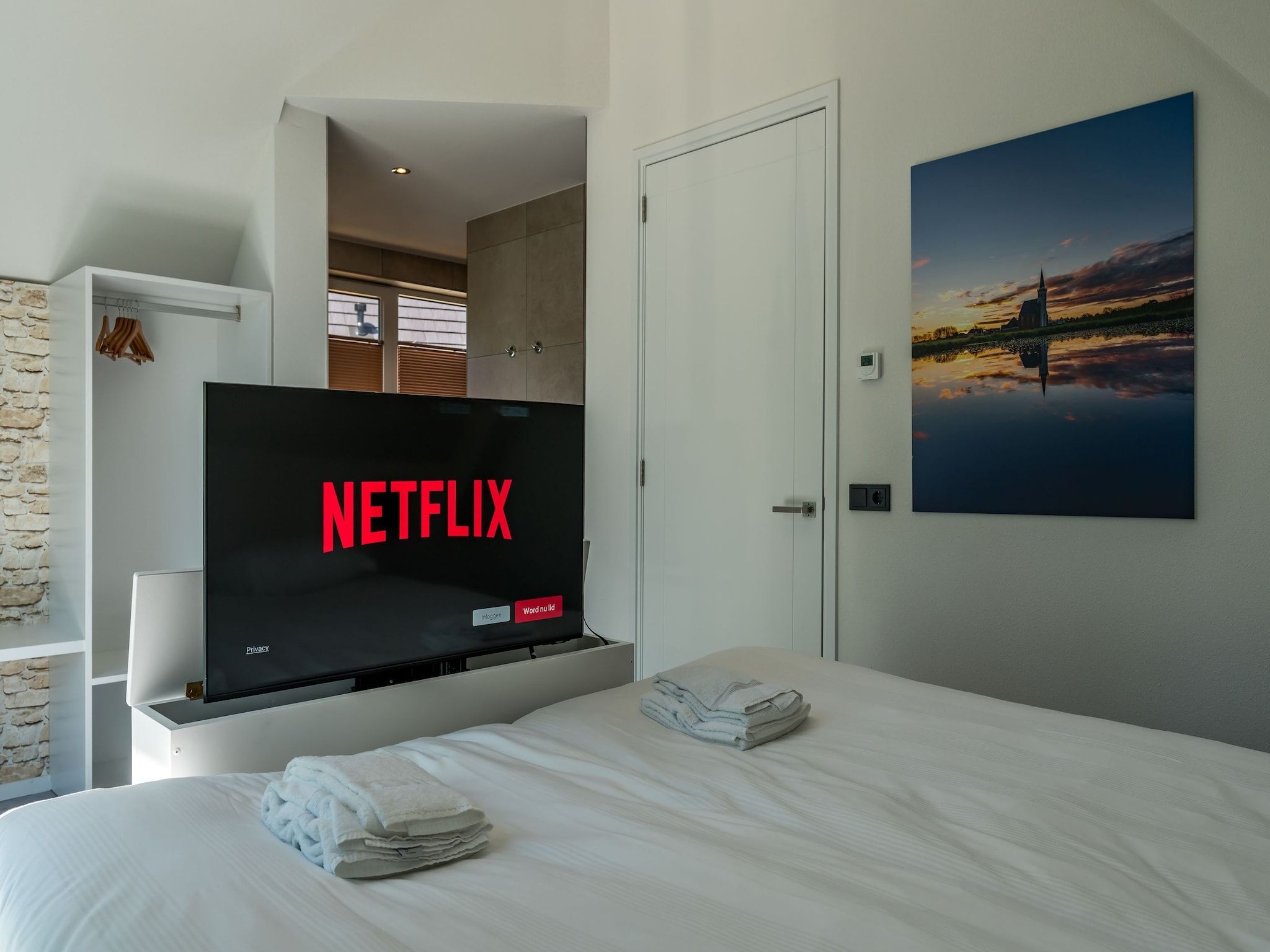 Een slaapkamer van Bruine Kiekendief in Den Burg