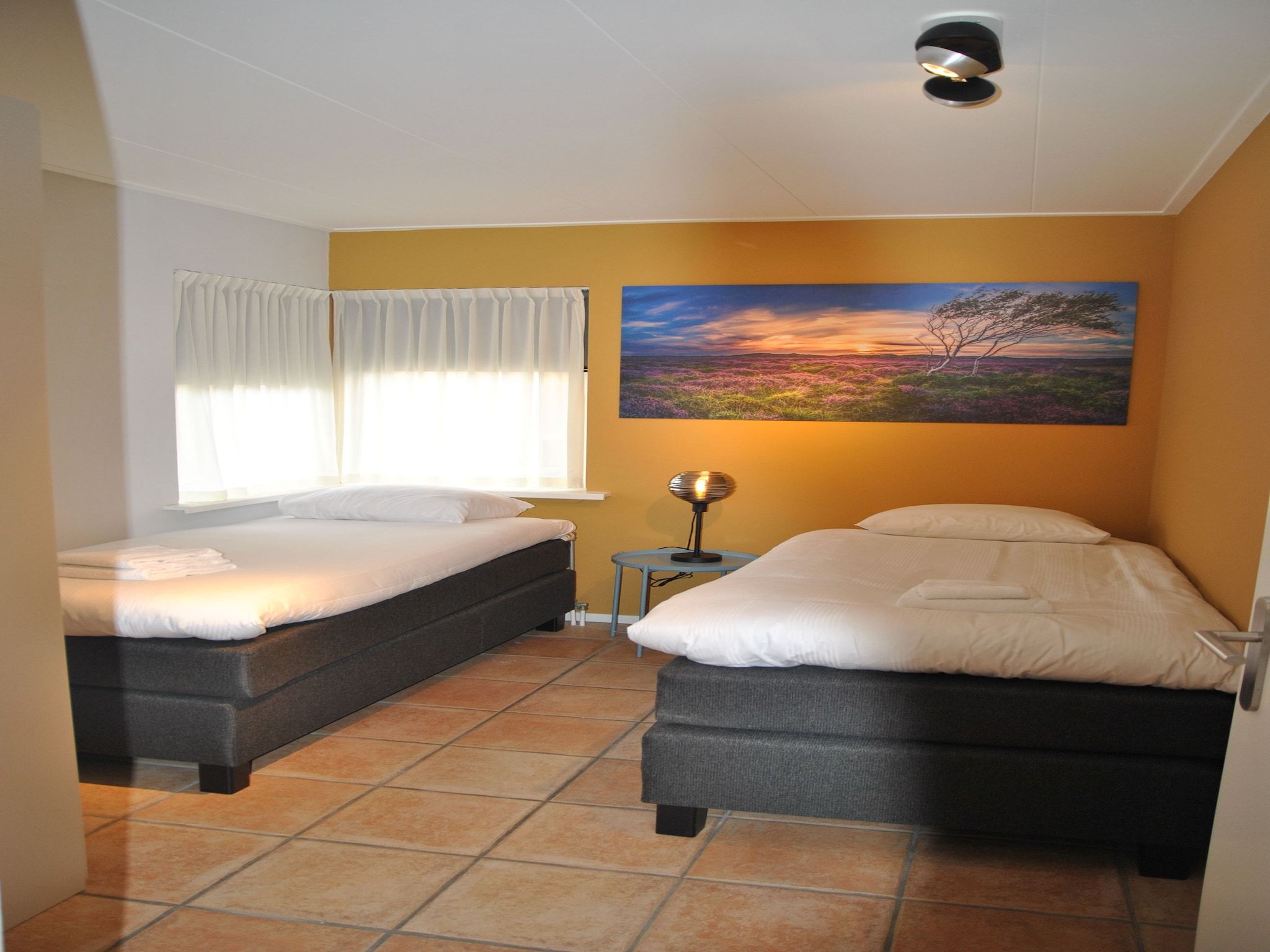 Een slaapkamer van Zilte Bries in De Koog Texel