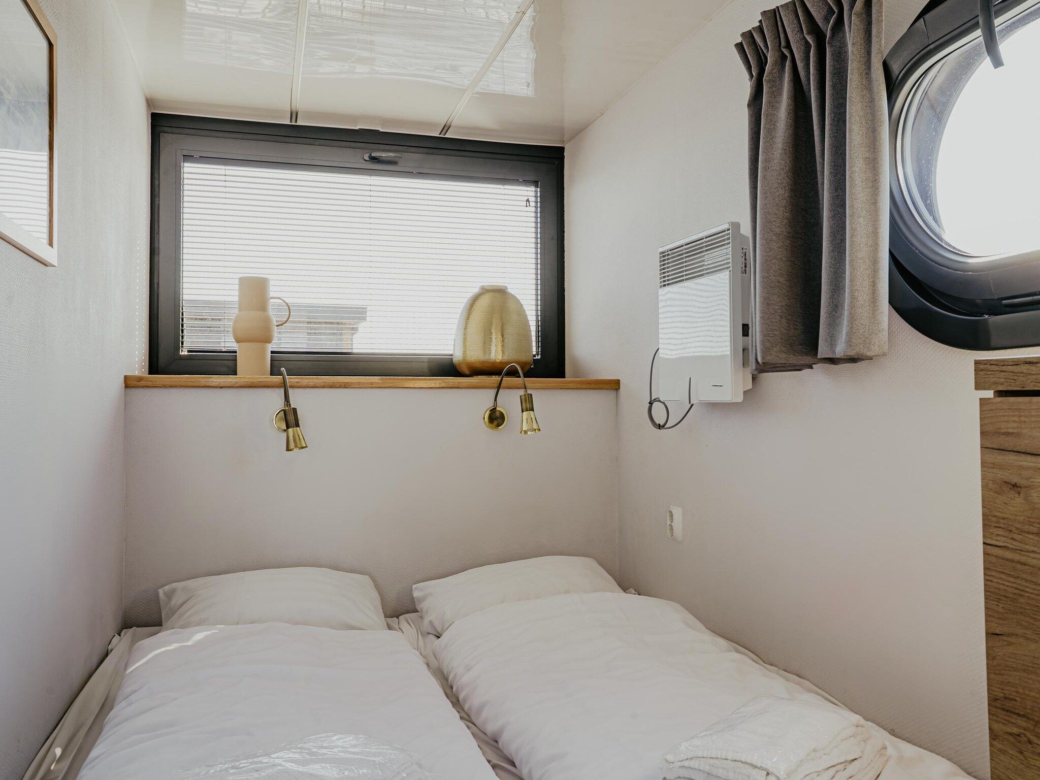 Een slaapkamer van Waterpark de Meerparel 10 in Uitgeest