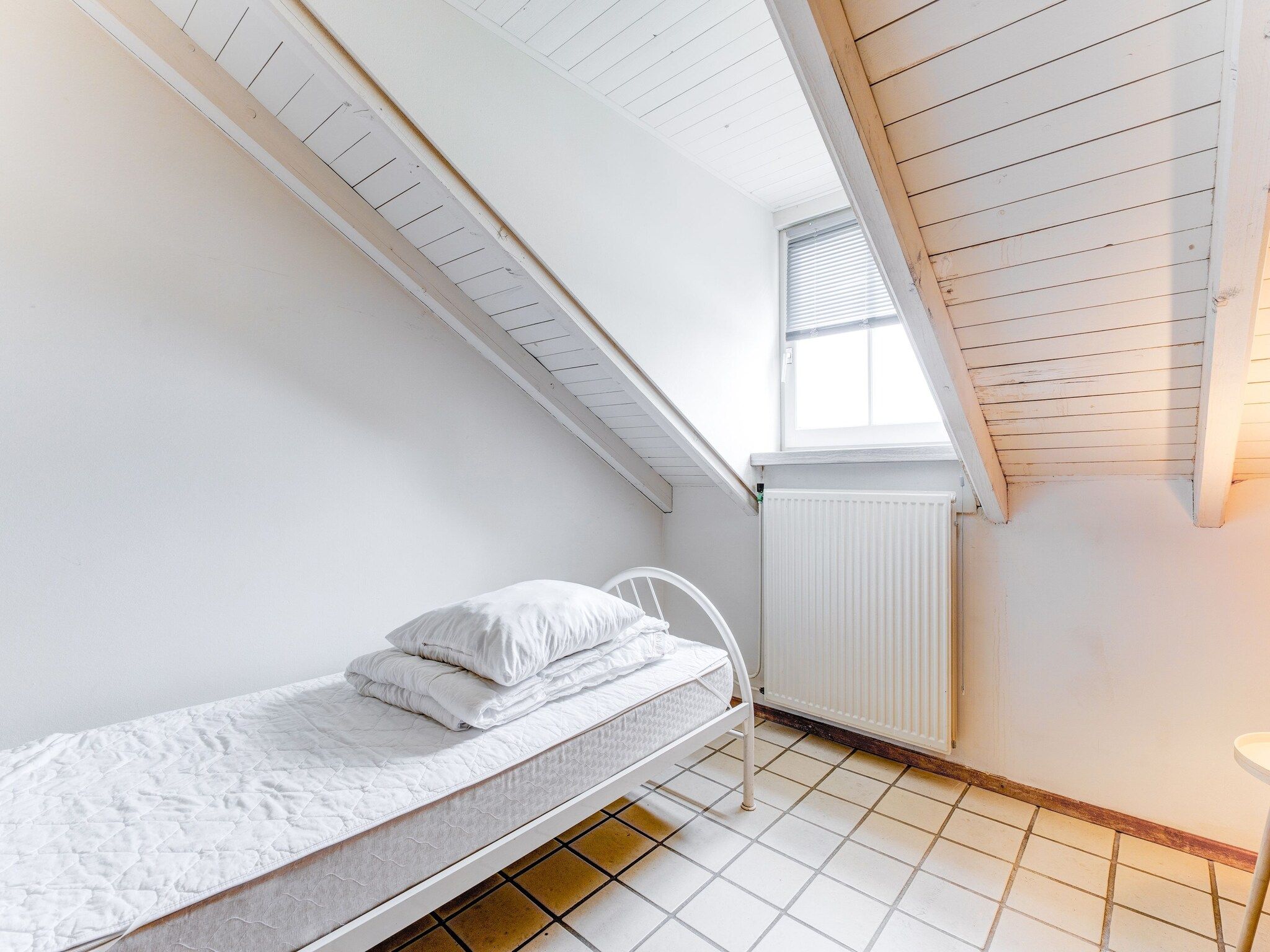 Een slaapkamer van Valleyview Cottages - NR12 in Voerendaal