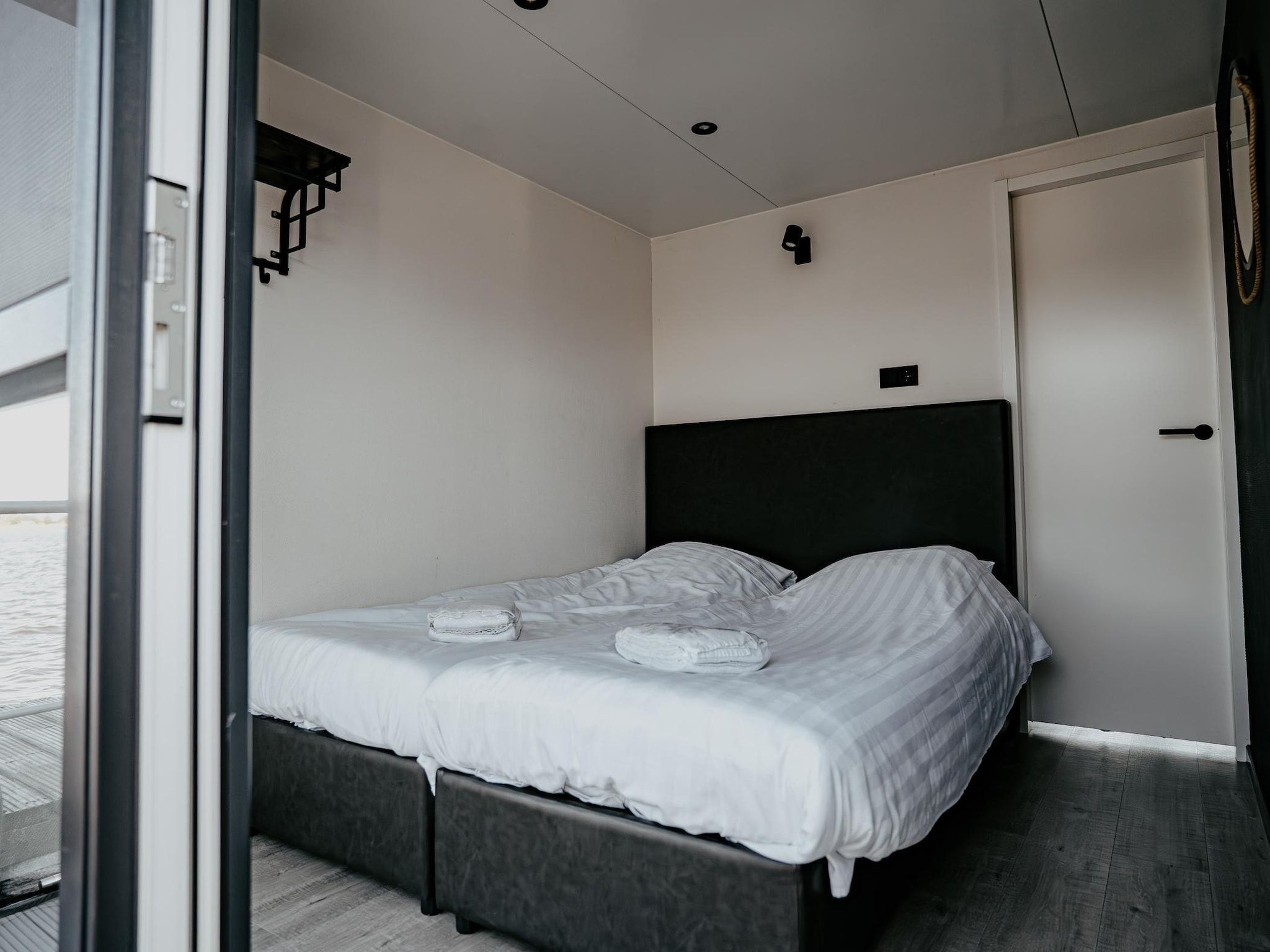 Een slaapkamer van Waterpark de Meerparel 11 in Uitgeest