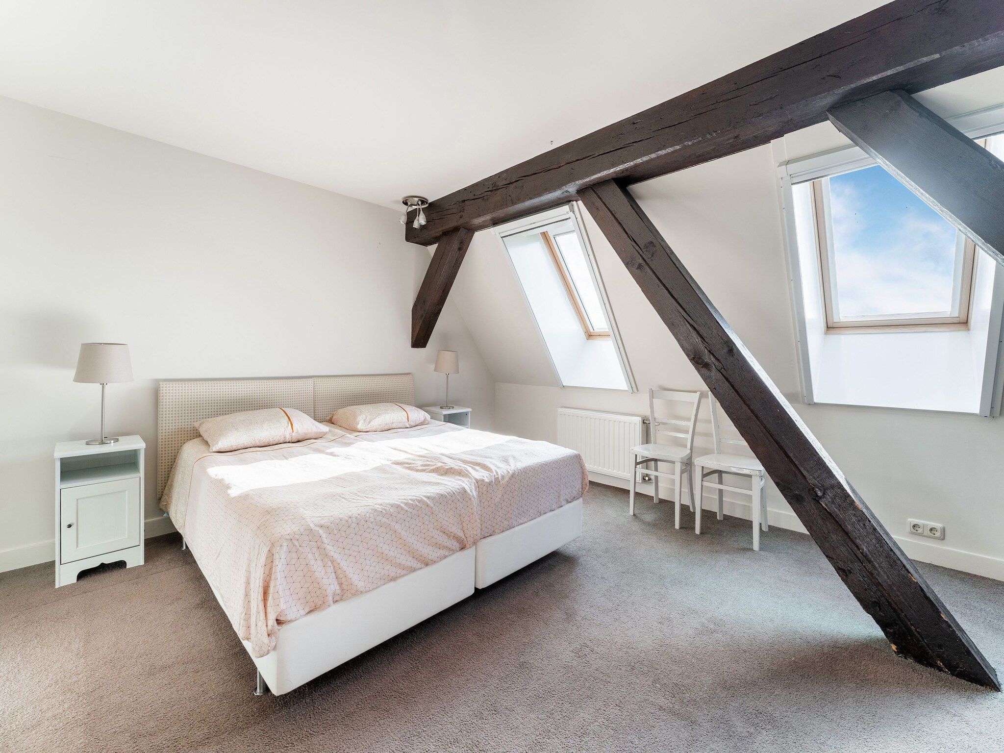 Een slaapkamer van De Pauwenhof in Heiloo