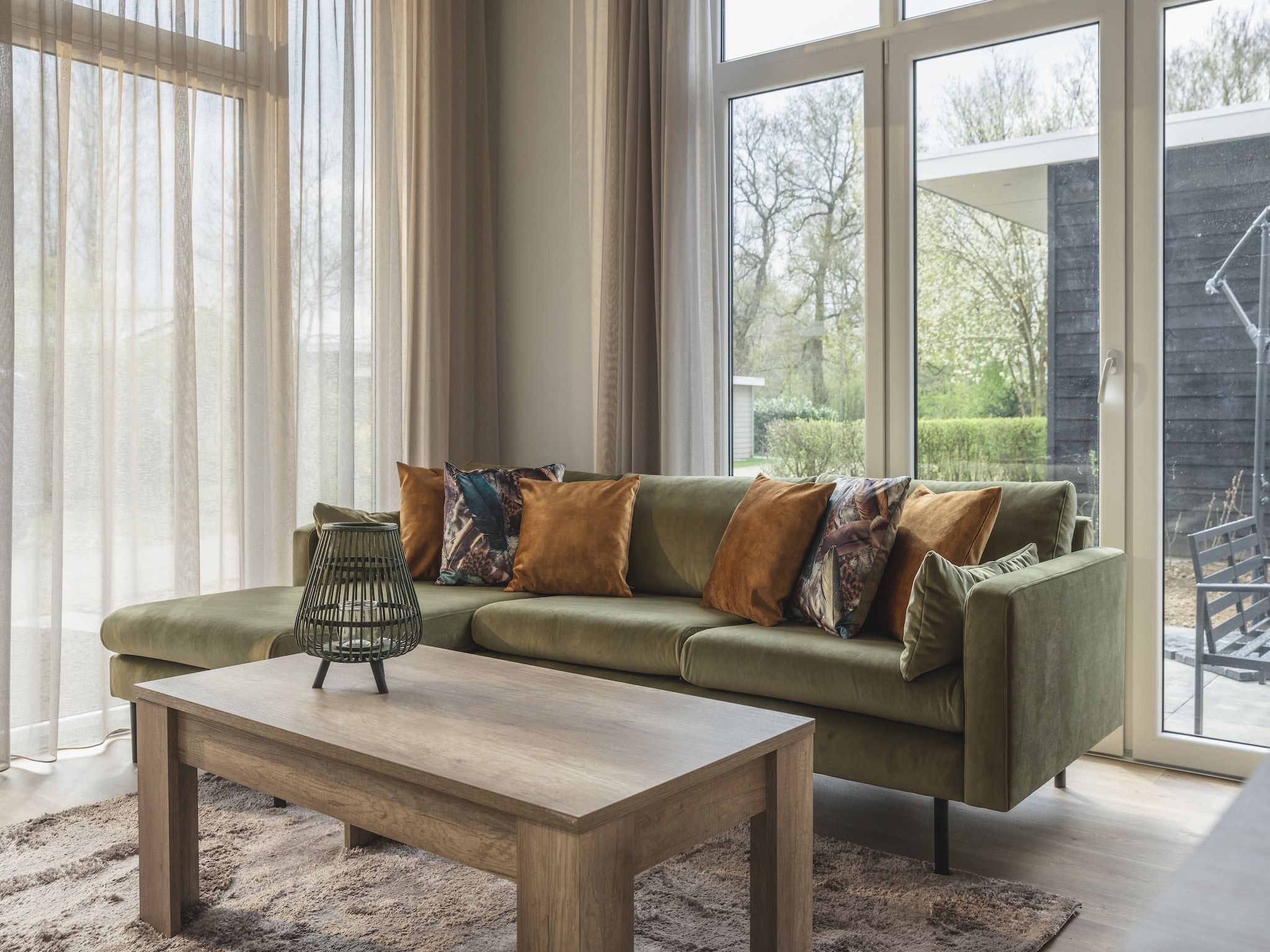 De woonkamer van Vakantiepark Mölke 29 in Zuna
