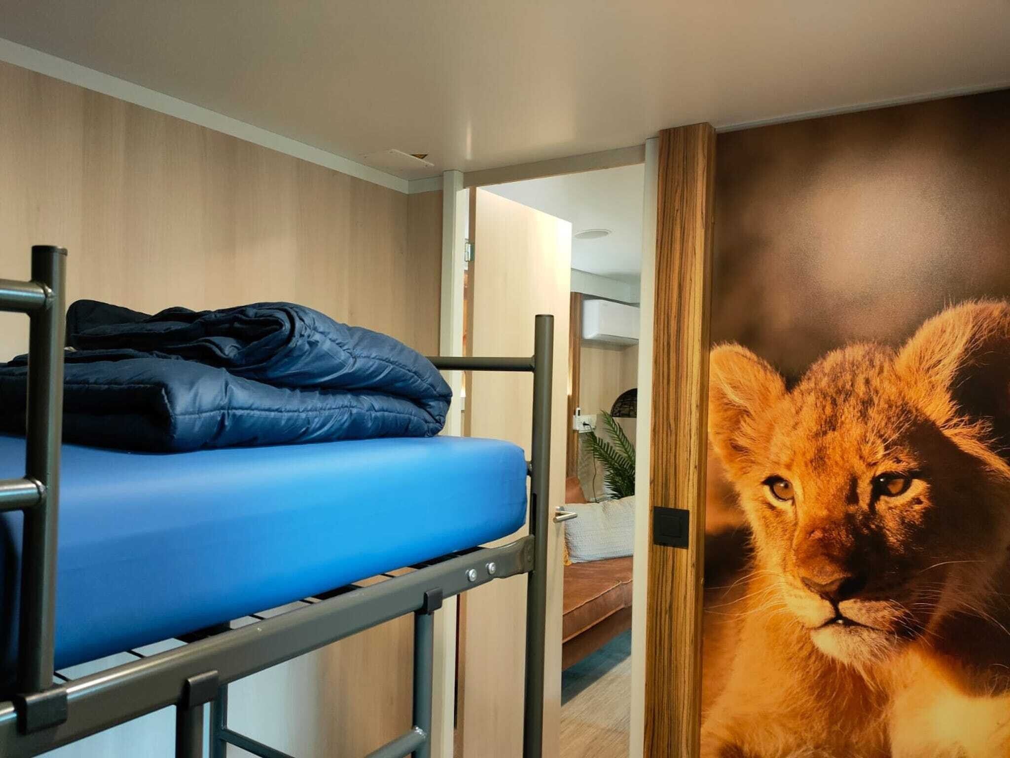 Een slaapkamer van Cottage 4 in Kaatsheuvel