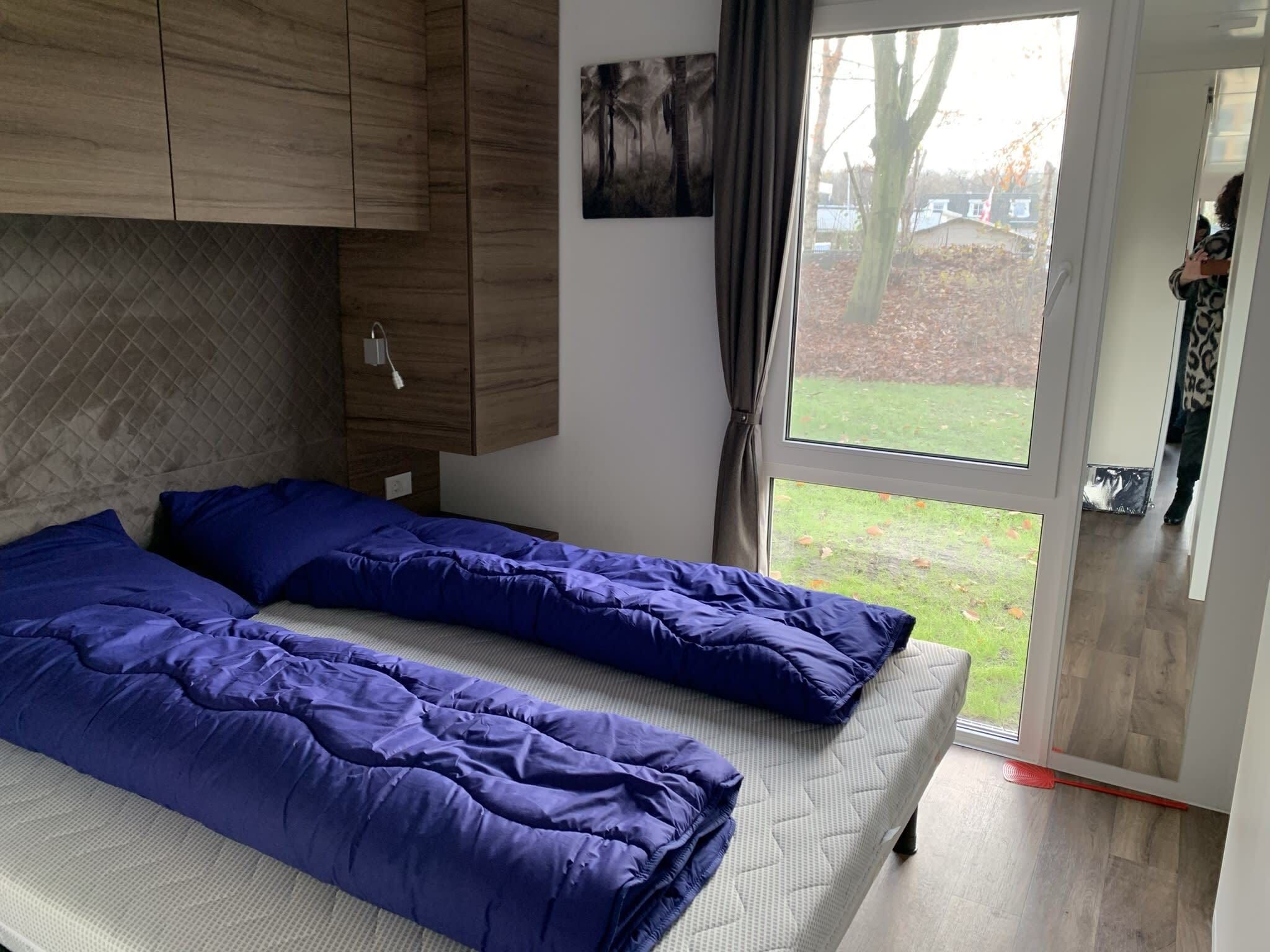 Een slaapkamer van Cottage 4 in Kaatsheuvel