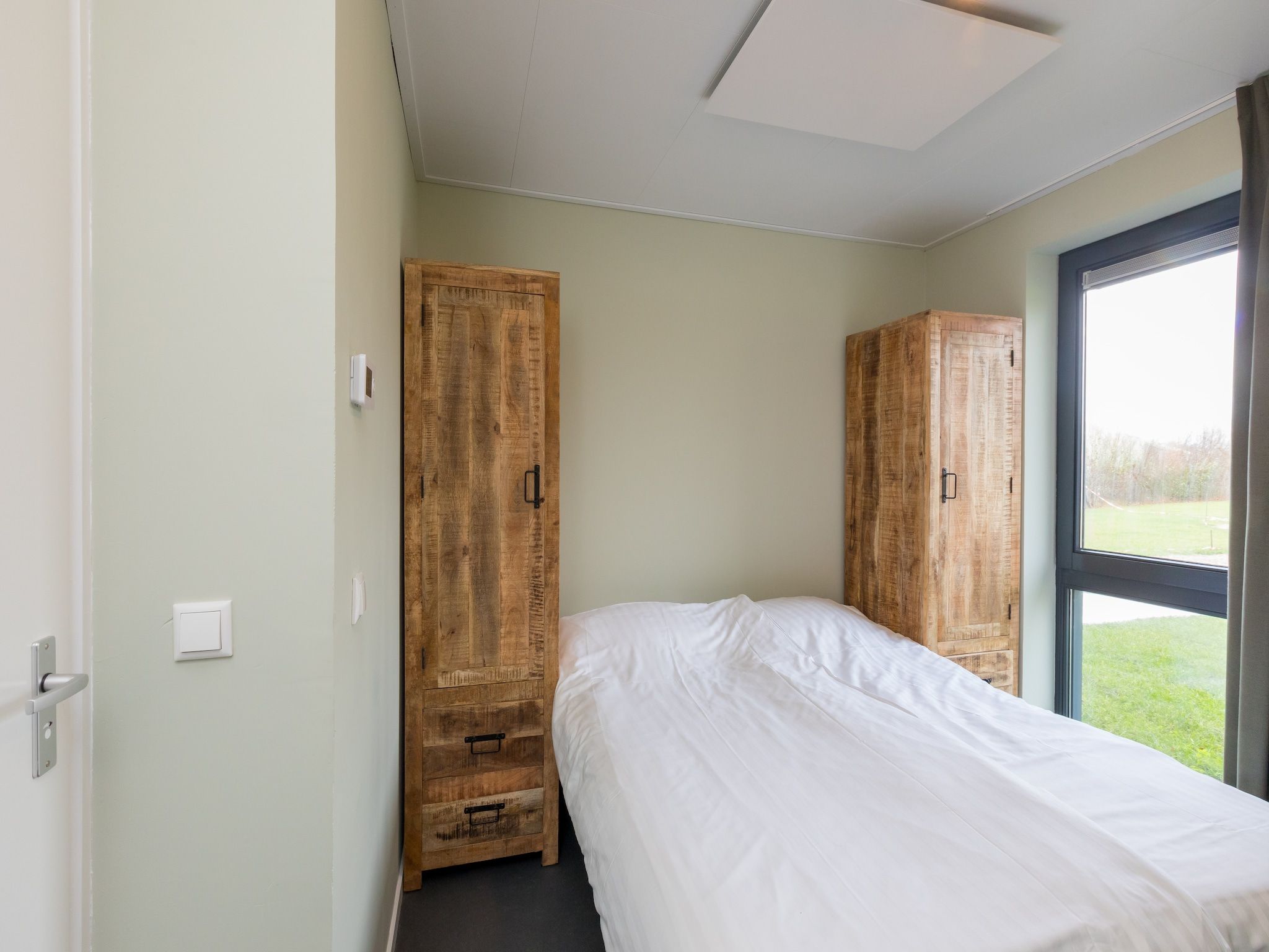 Een slaapkamer van Vroondijk 2-Zeebloesempje in Vrouwenpolder
