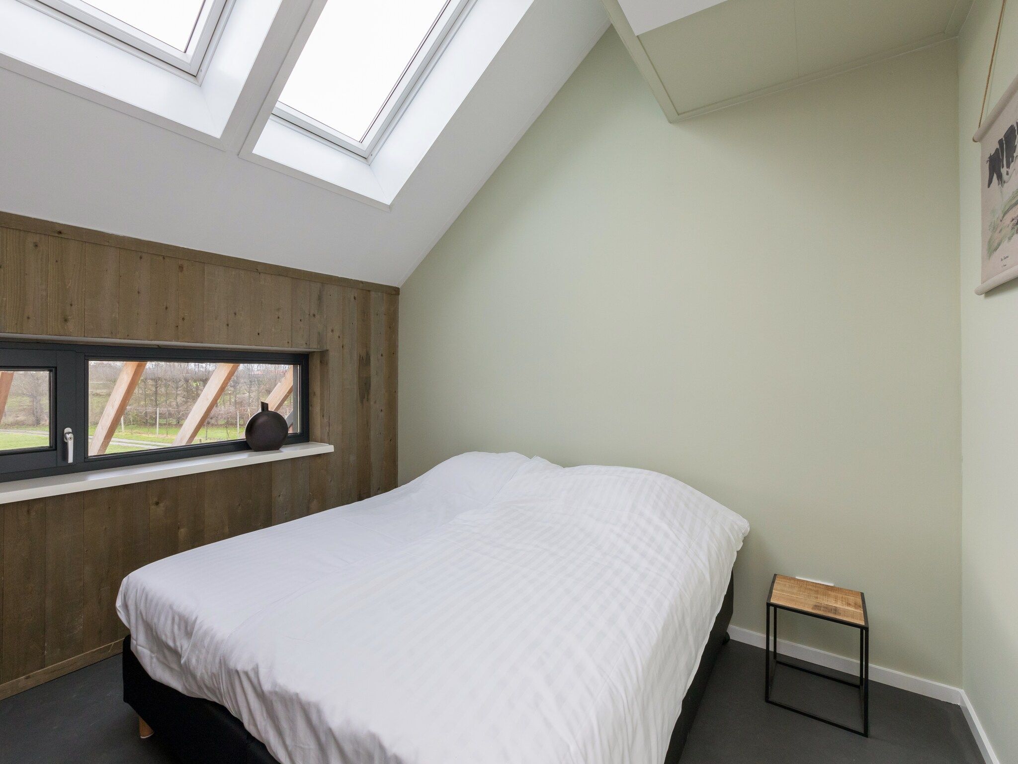 Een slaapkamer van Vroondijk 2-Zeebloesempje in Vrouwenpolder