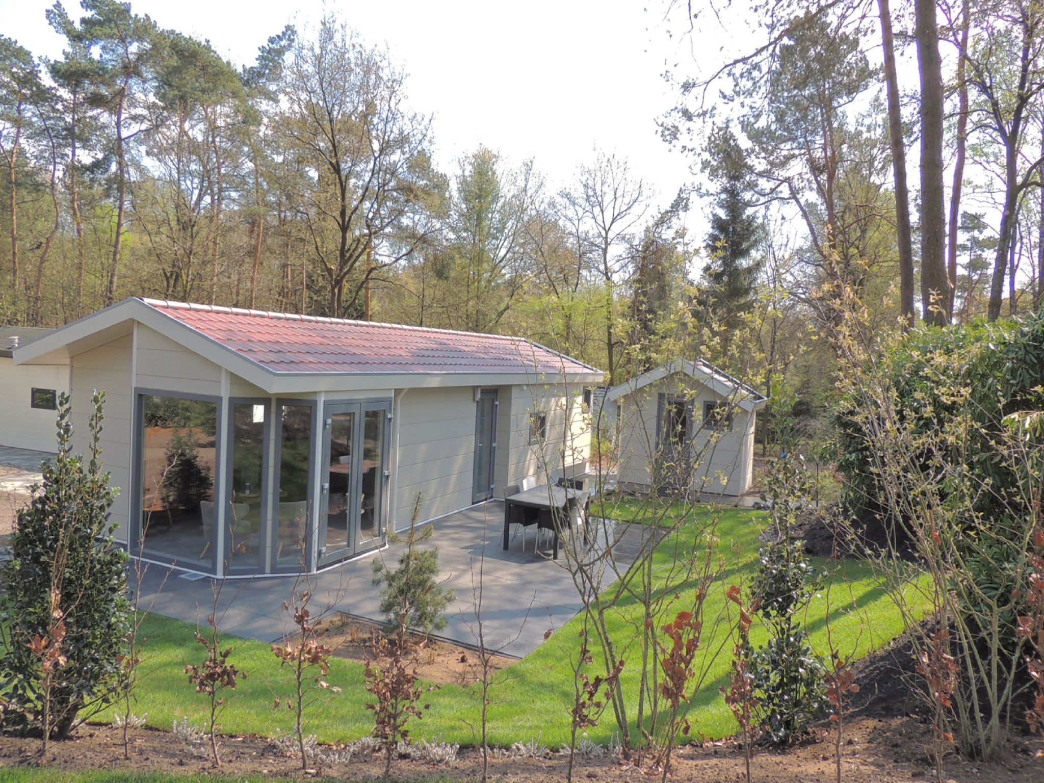De buitenkant van Vakantiepark De Rimboe & De Woeste Hoogte 13 in Hoenderloo