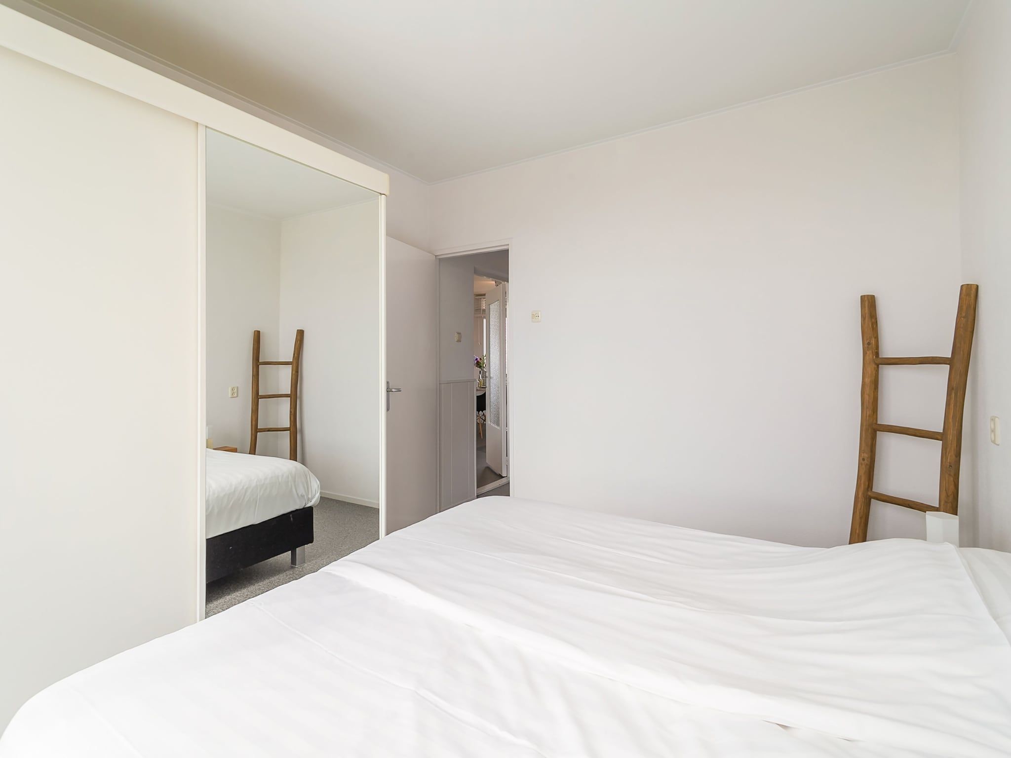 Een slaapkamer van Vitamine Zee in Egmond aan Zee