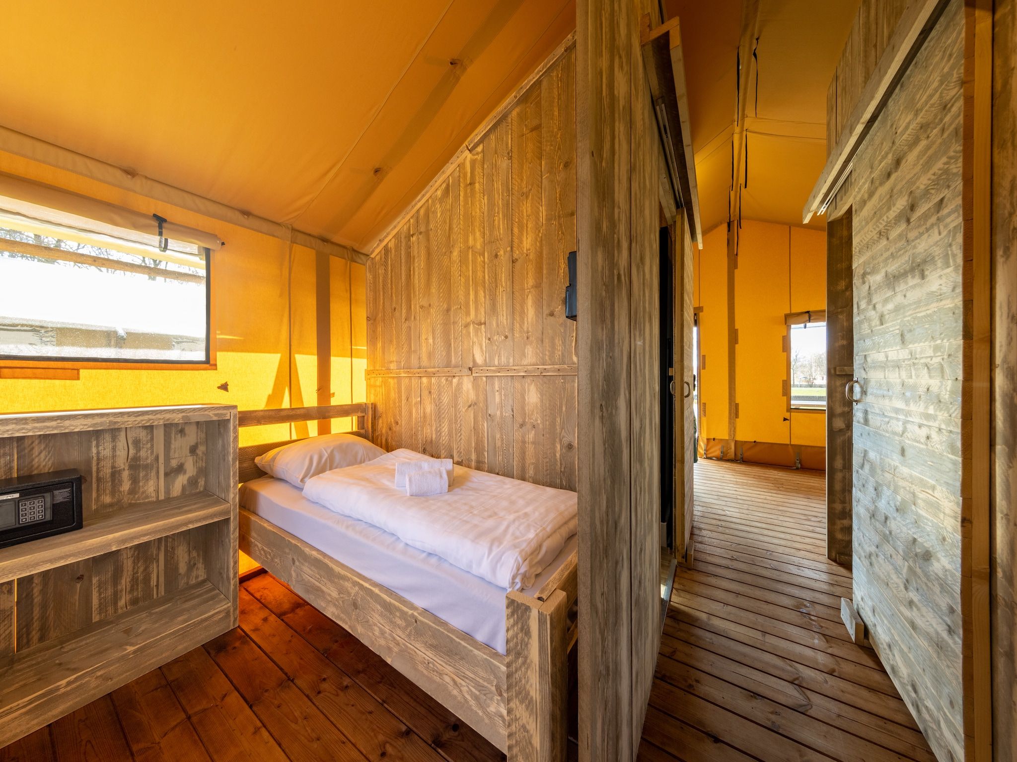 Een slaapkamer van Hunzepark 15 in Gasselternijveen