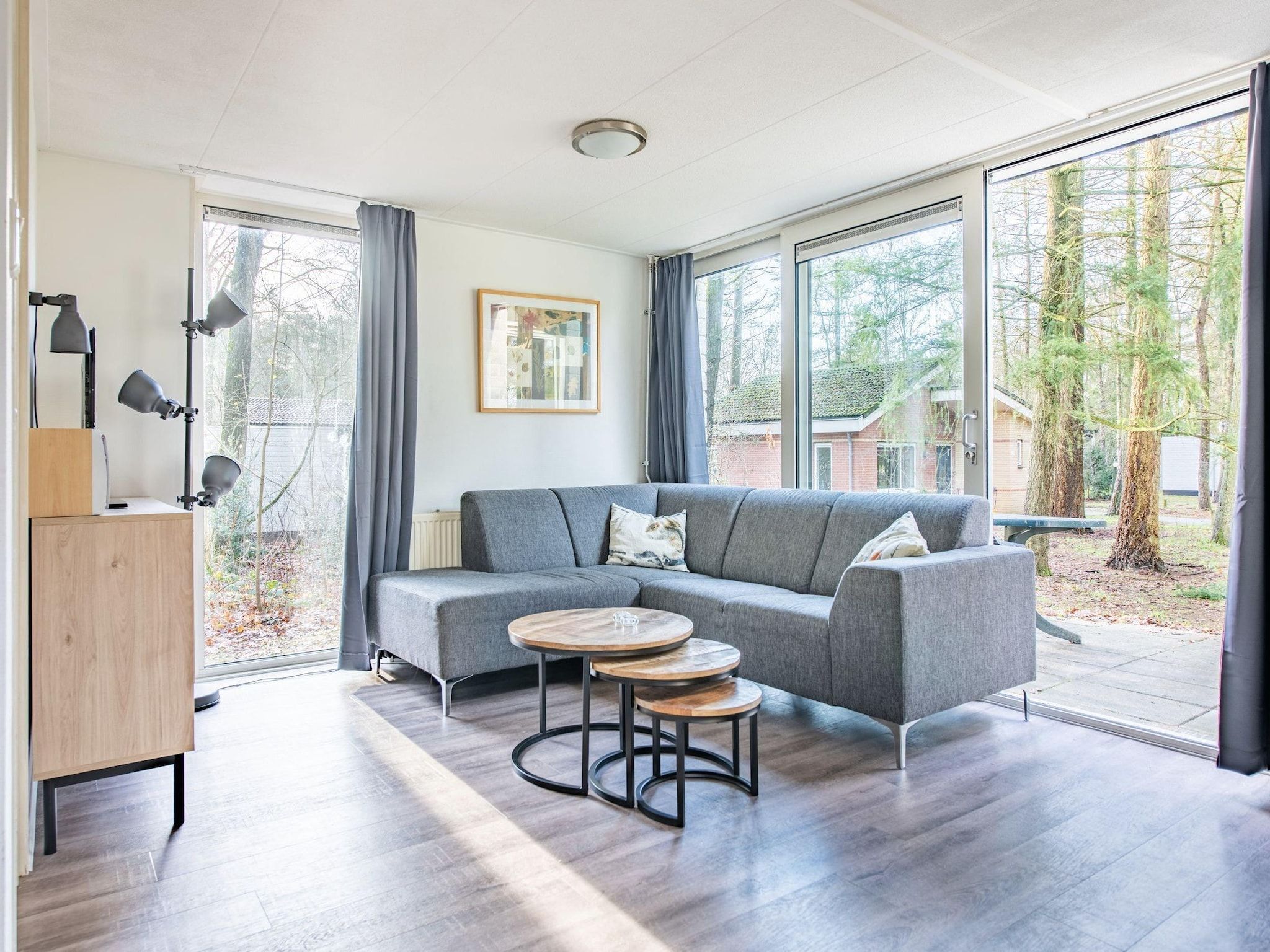 De woonkamer van Vakantiepark de Berkenhorst 11 in Kootwijk