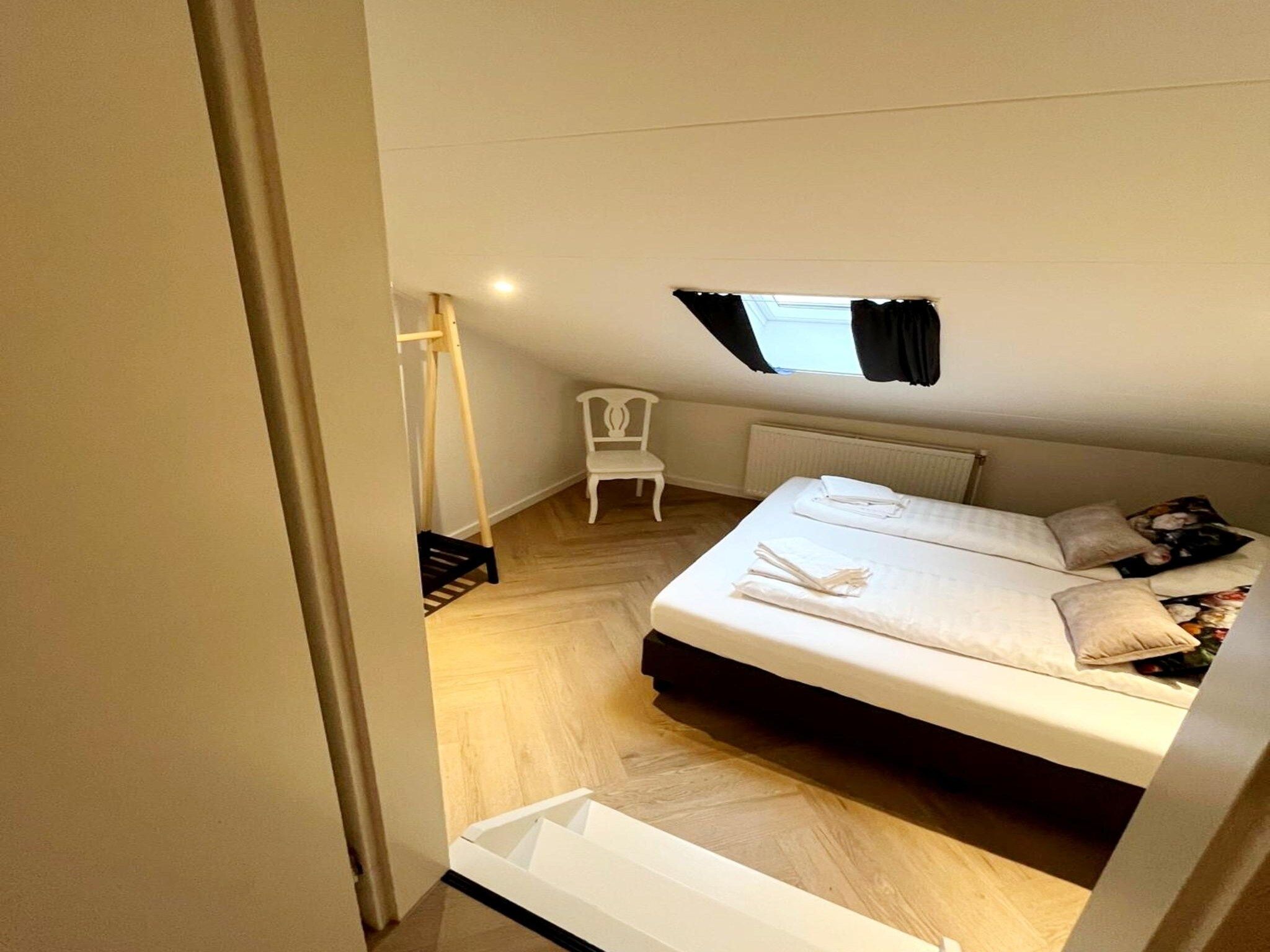 Een slaapkamer van Valleyview Cottages - NR13 in Voerendaal