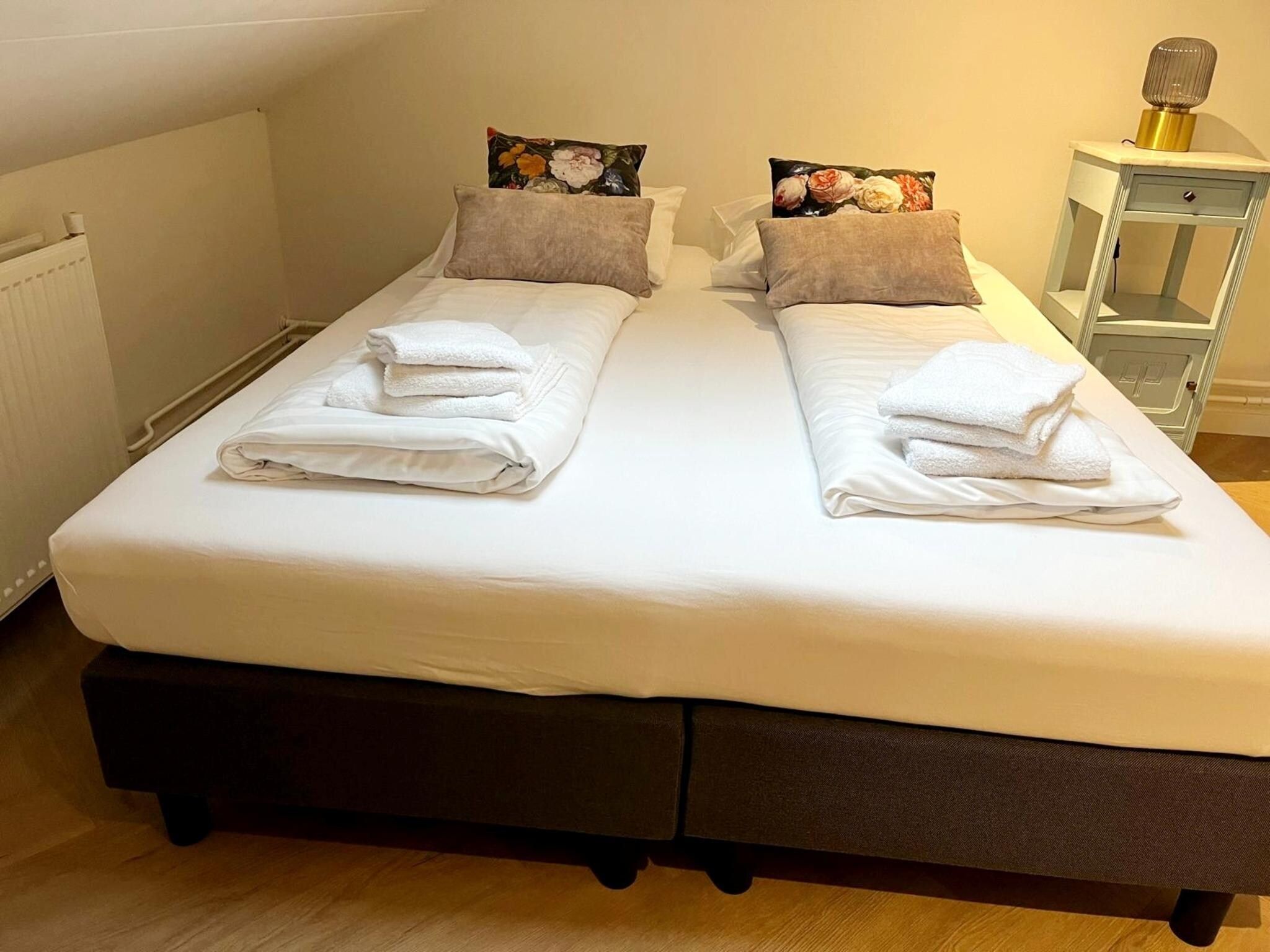 Een slaapkamer van Valleyview Cottages - NR13 in Voerendaal