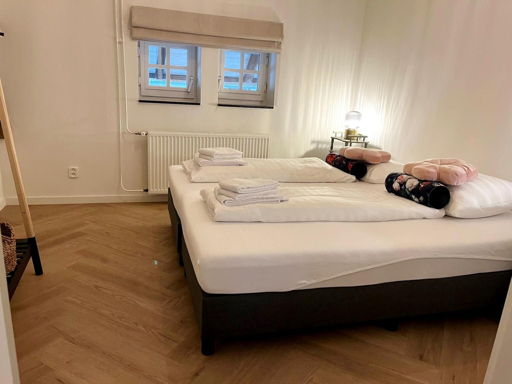 Een slaapkamer van Valleyview Cottages - NR13 in Voerendaal