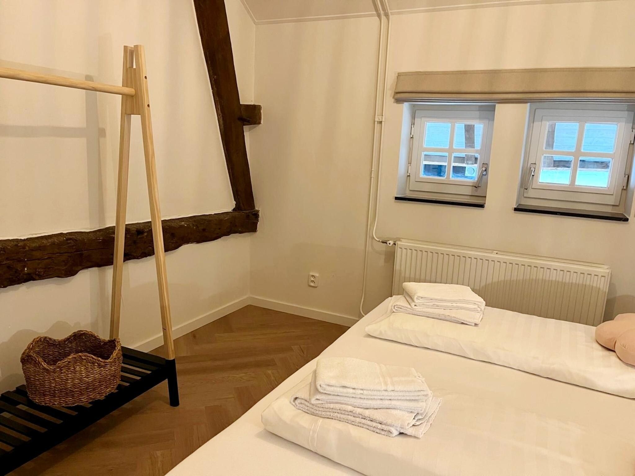 Een slaapkamer van Valleyview Cottages - NR13 in Voerendaal