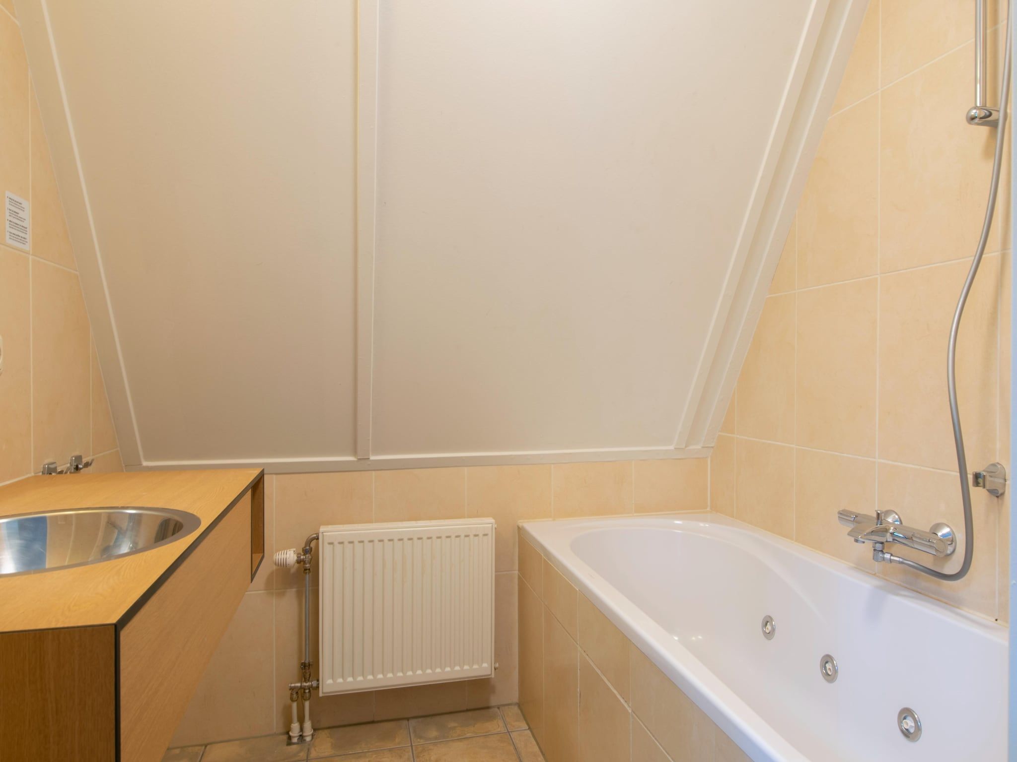 De badkamer van Vakantiepark de Katjeskelder 16 in Oosterhout