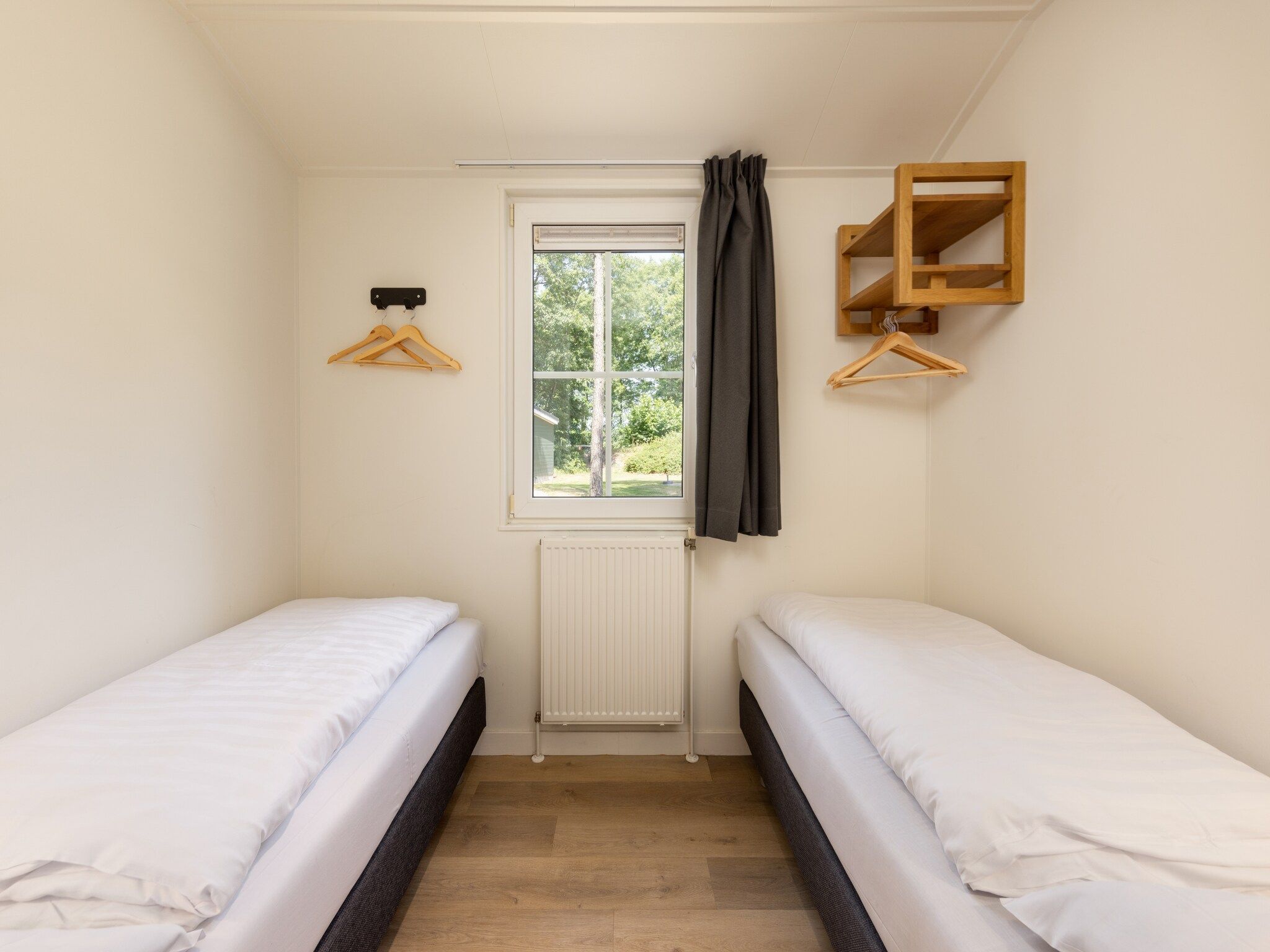 Een slaapkamer van Park De Peel 1 in Vlierden
