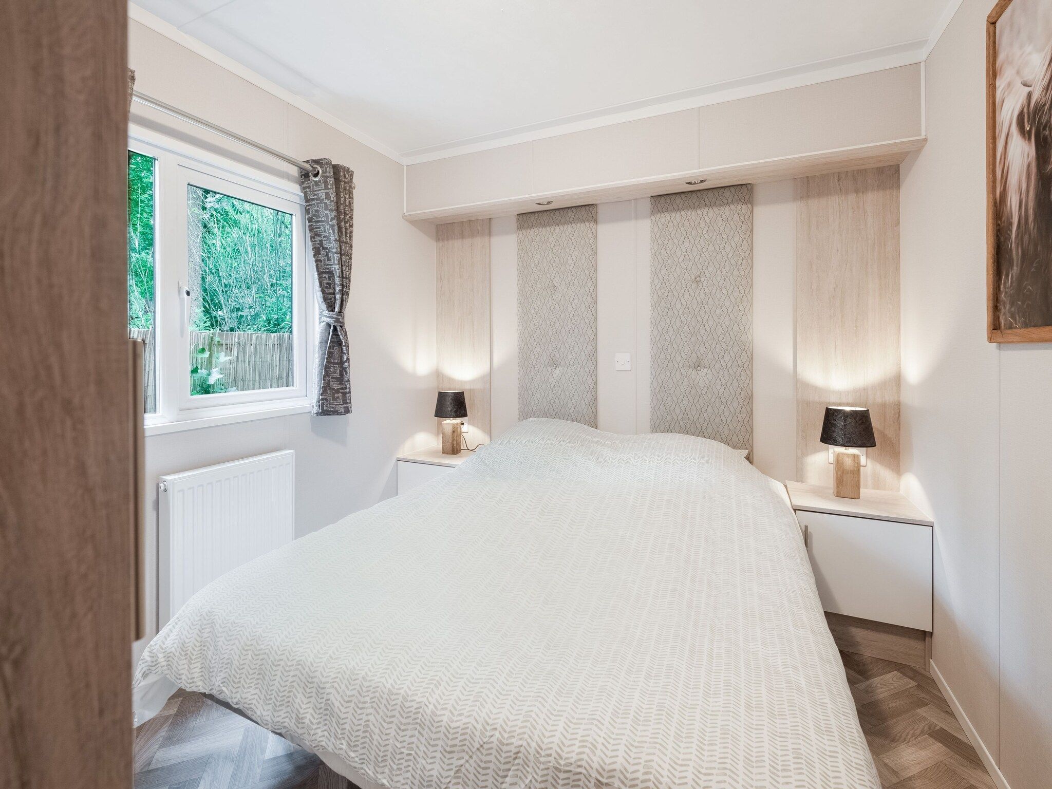 Een slaapkamer van Chalet in Vledder in Vledder