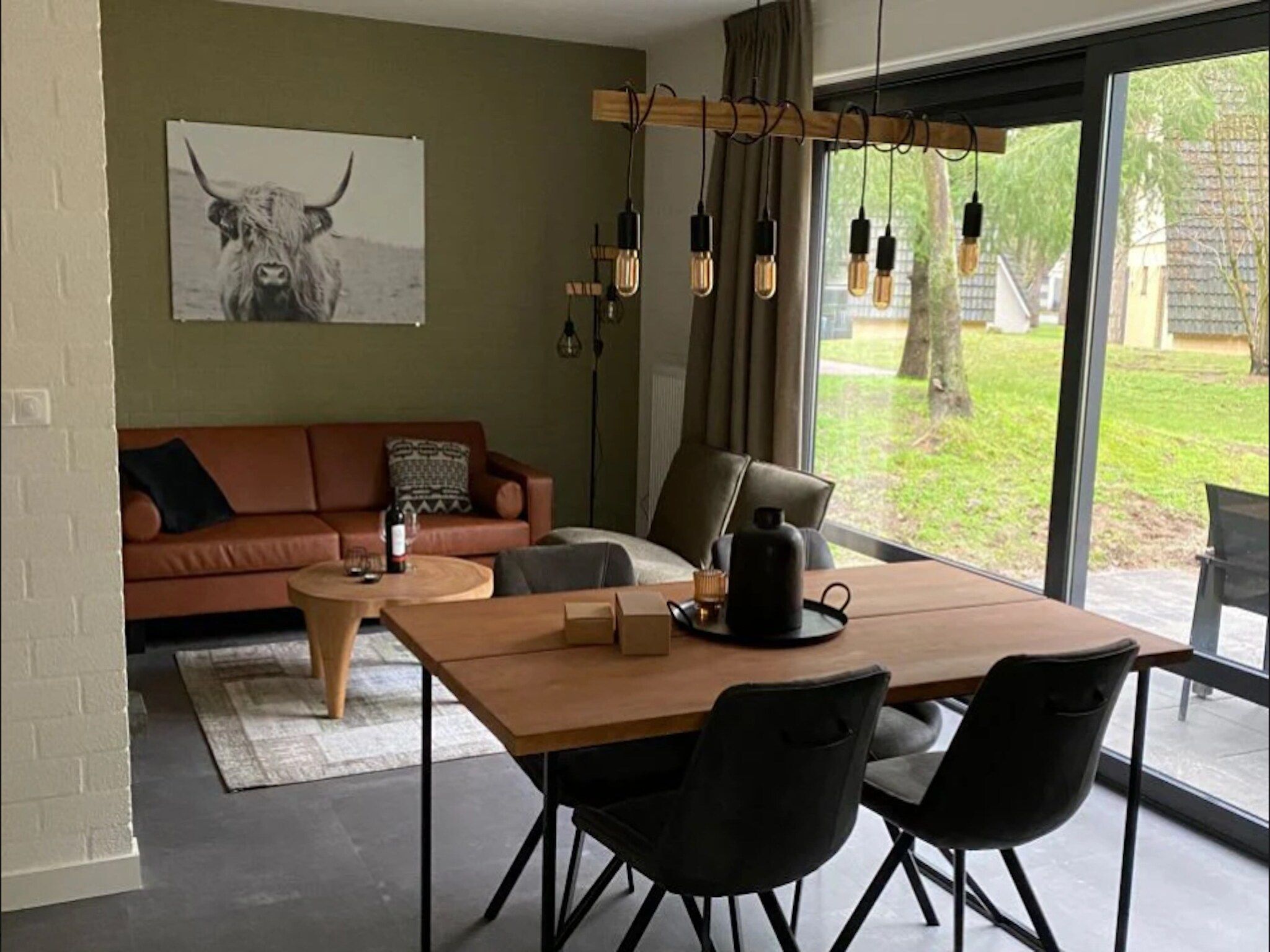 De woonkamer van Vakantiepark de Katjeskelder 20 in Oosterhout