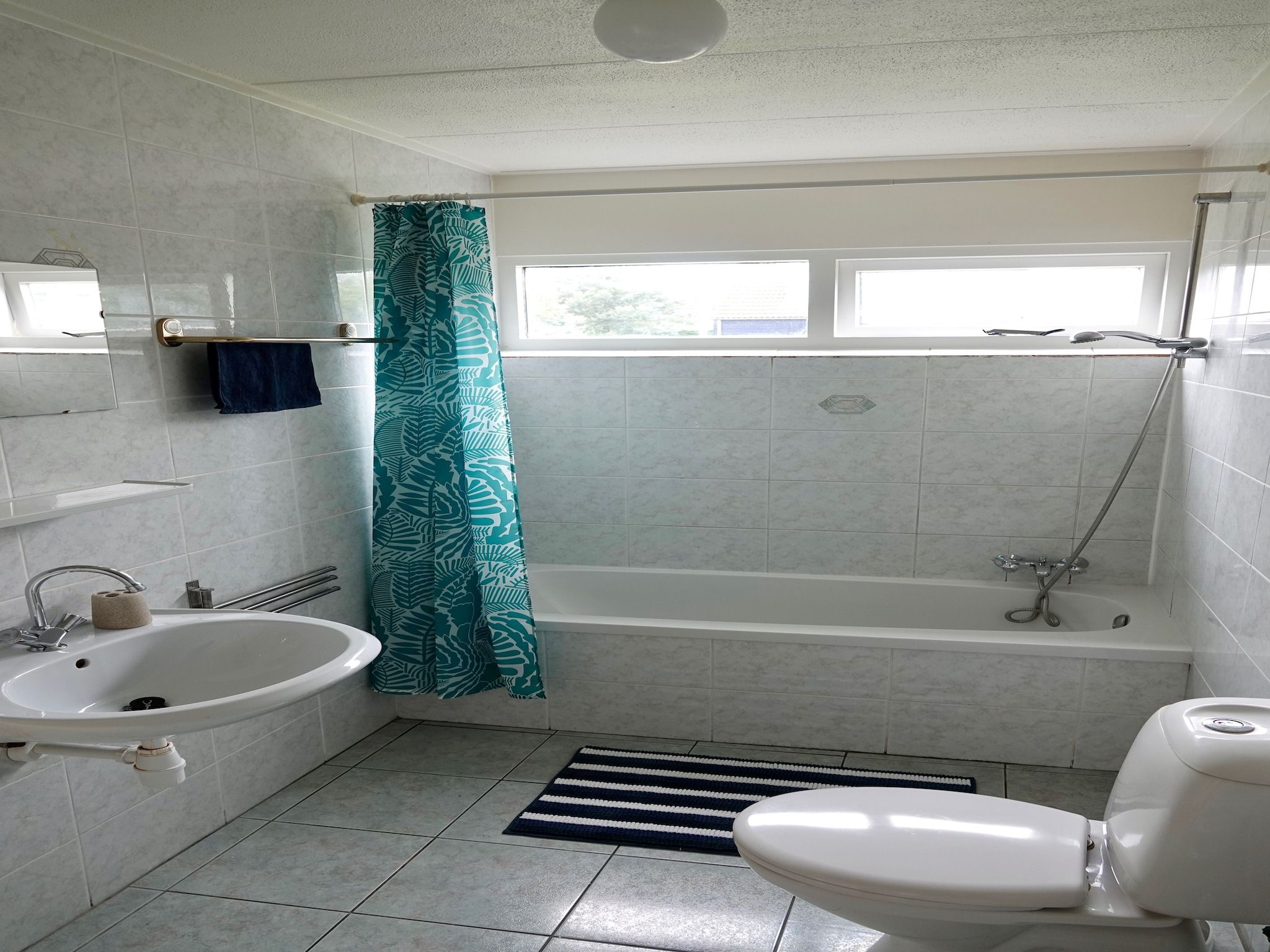 De badkamer van Calm Breeze in Noordwijkerhout