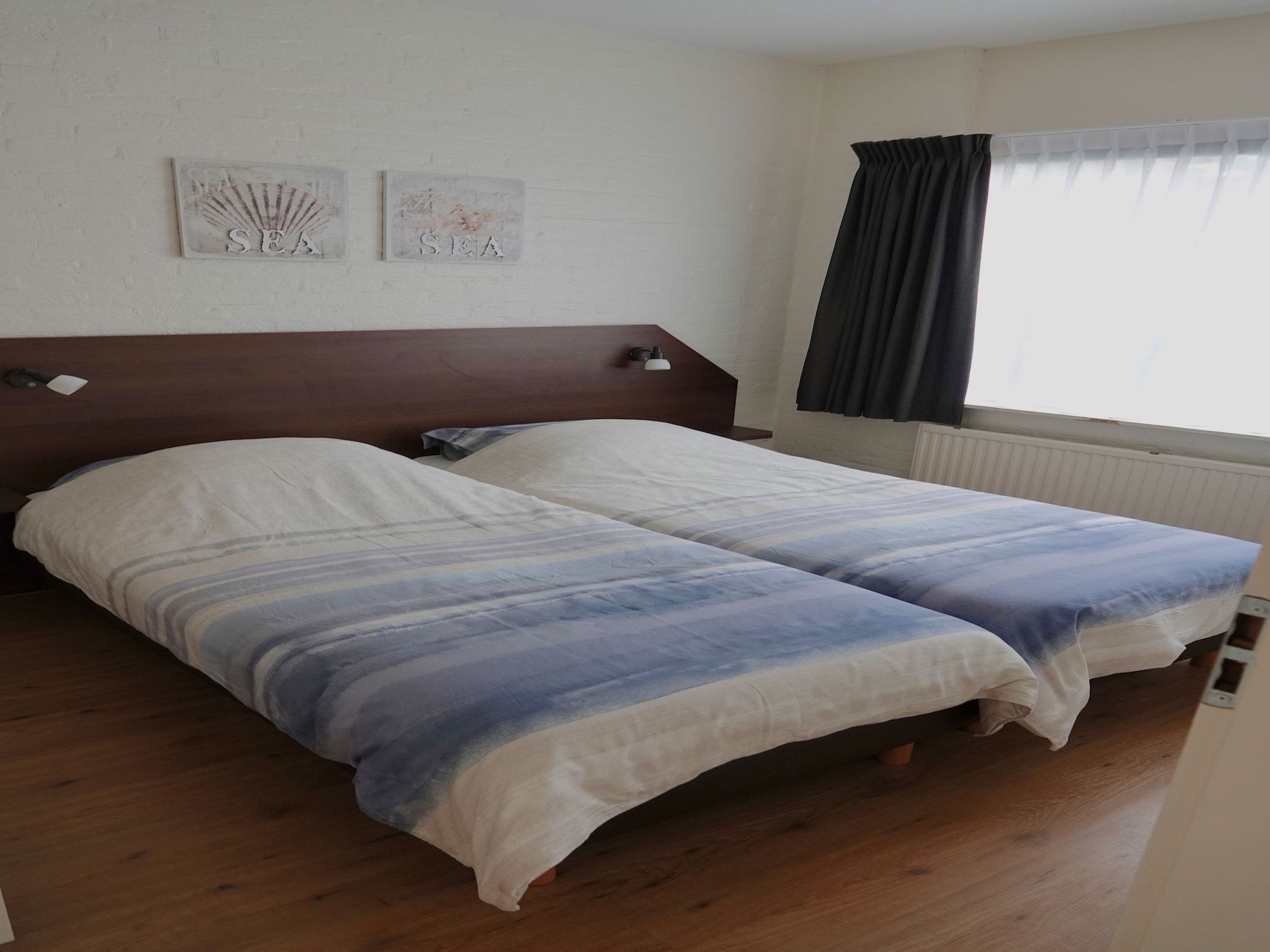 Een slaapkamer van Calm Breeze in Noordwijkerhout